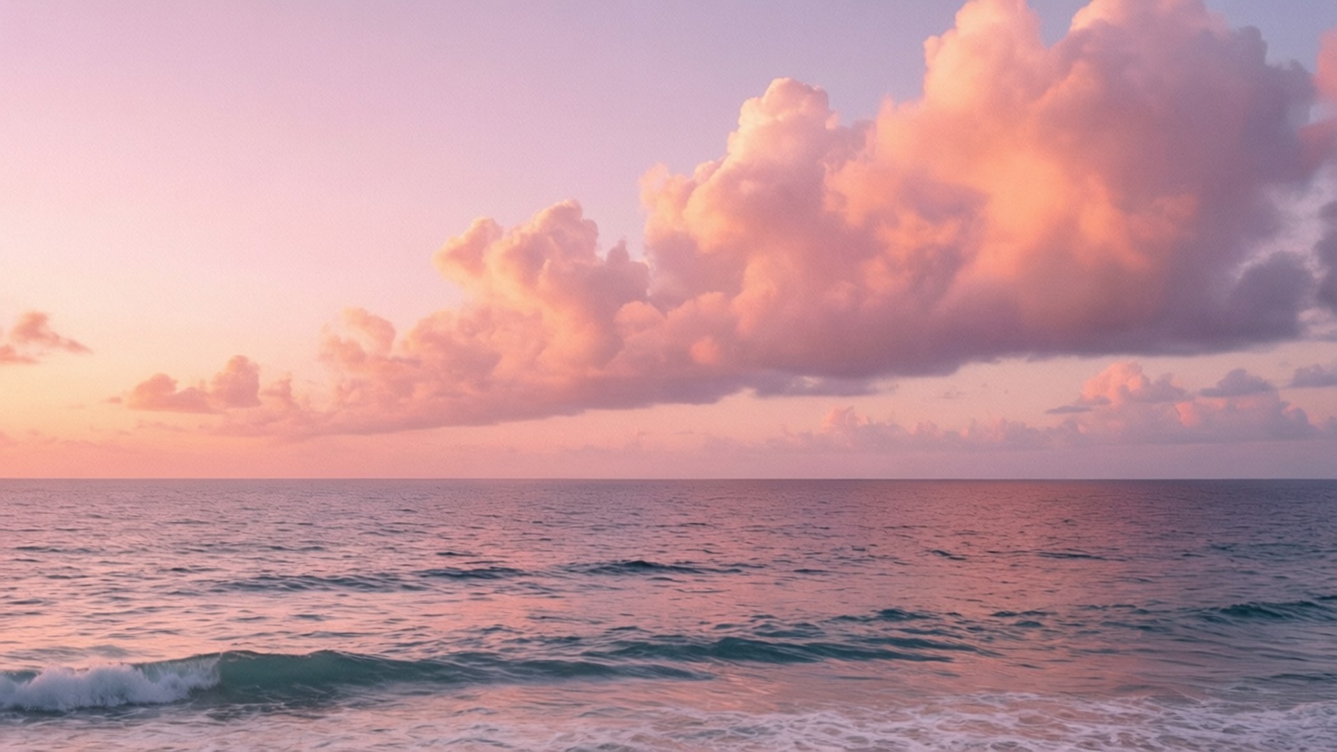Apus de soare pastelat peste ocean Fundal