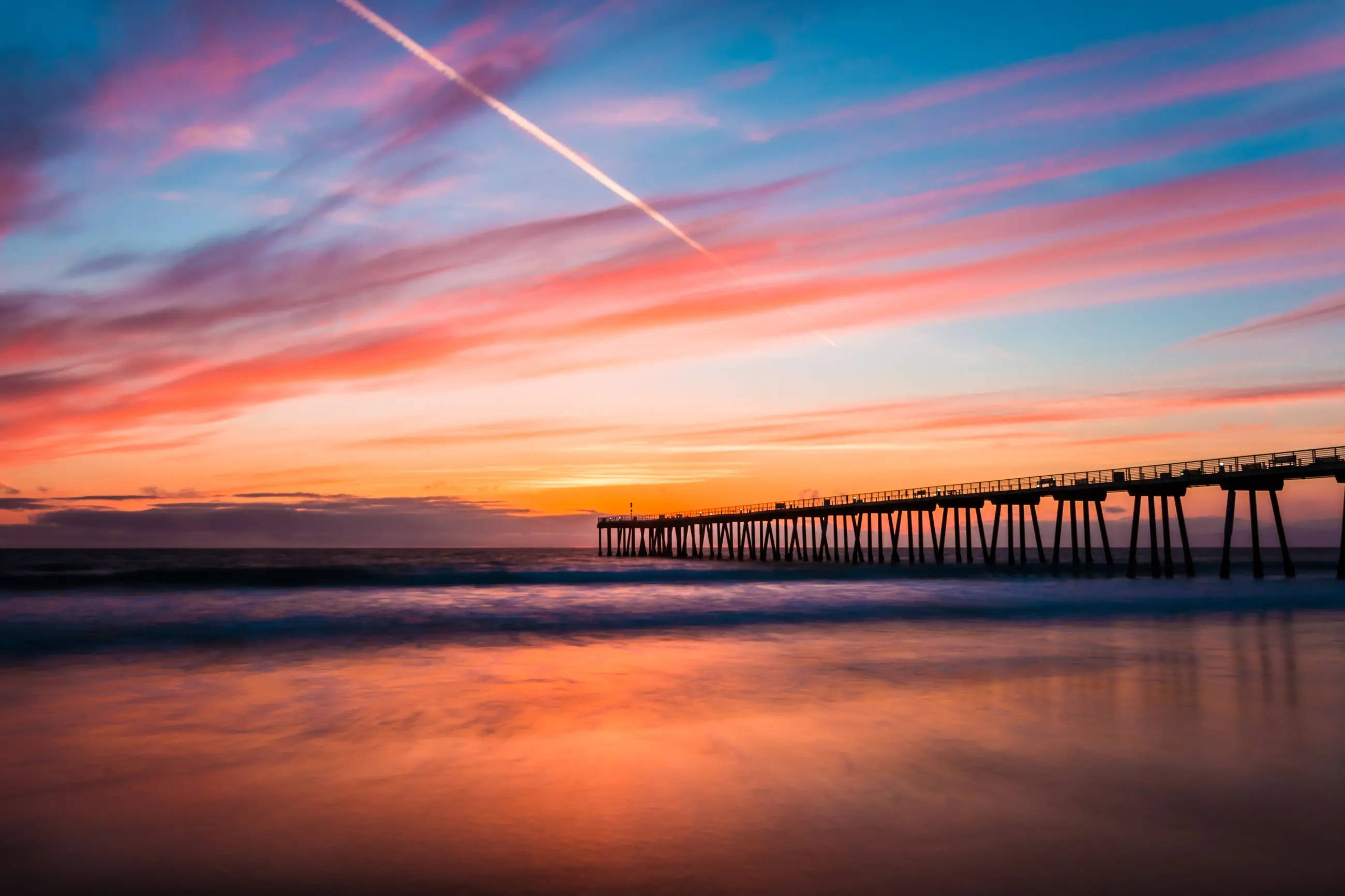 Apus de soare pe Hermosa Pier, Los Angeles Fundal