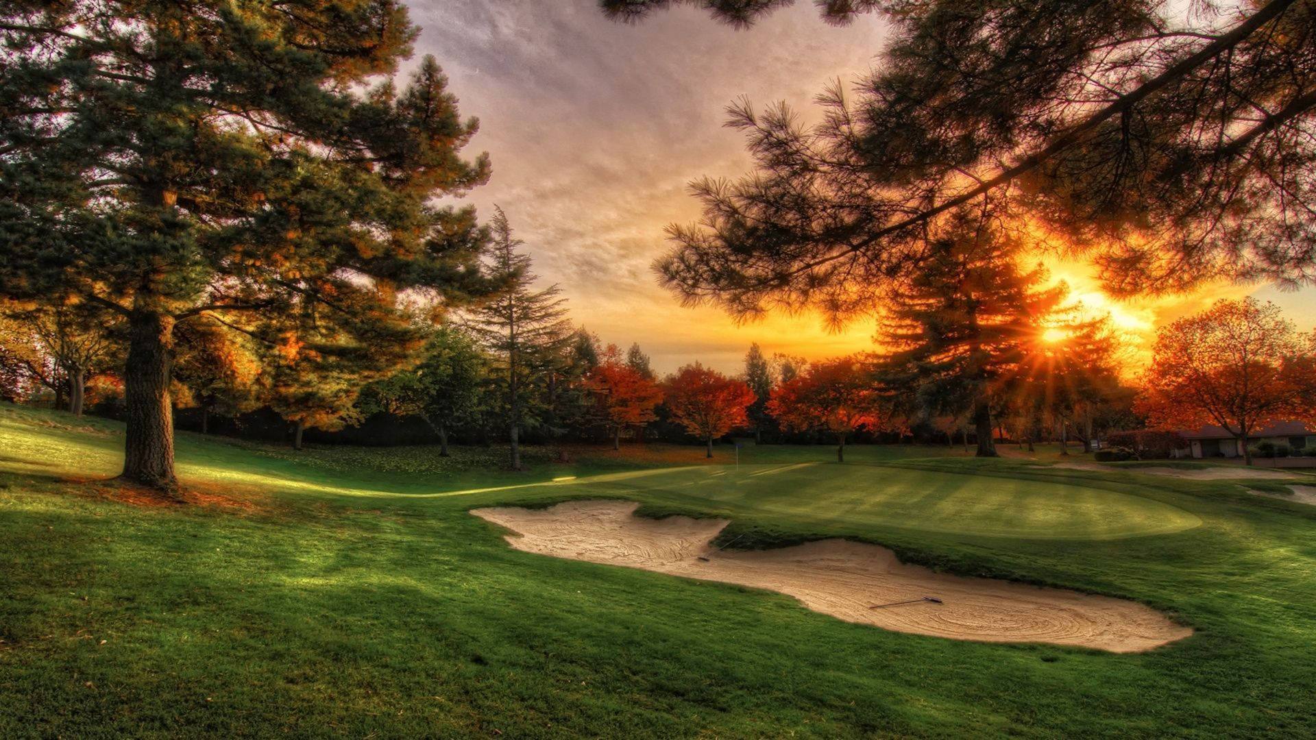 Apus de soare pe terenul de golf Fundal