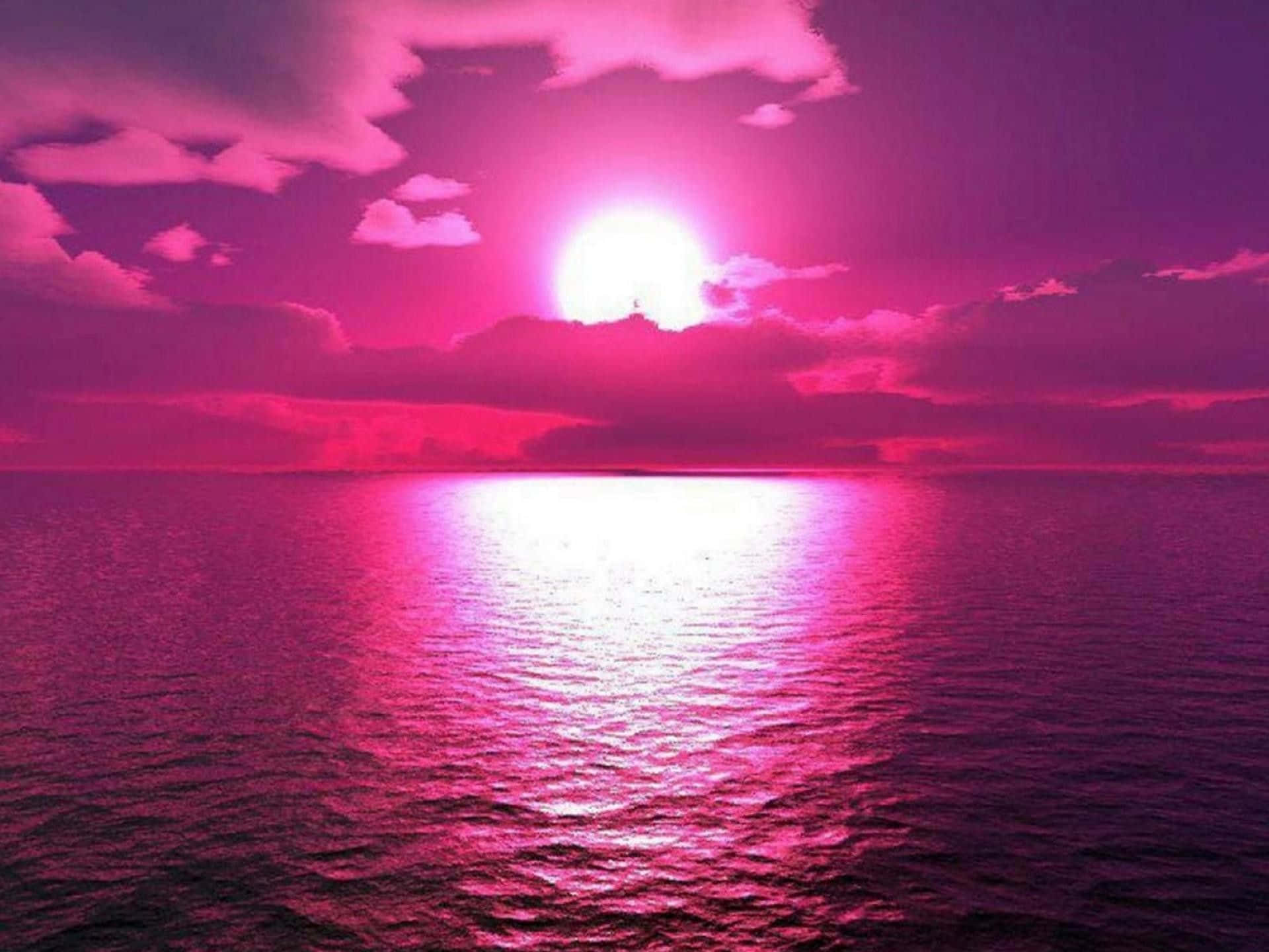 Apus de soare roz închis pe ocean Fundal