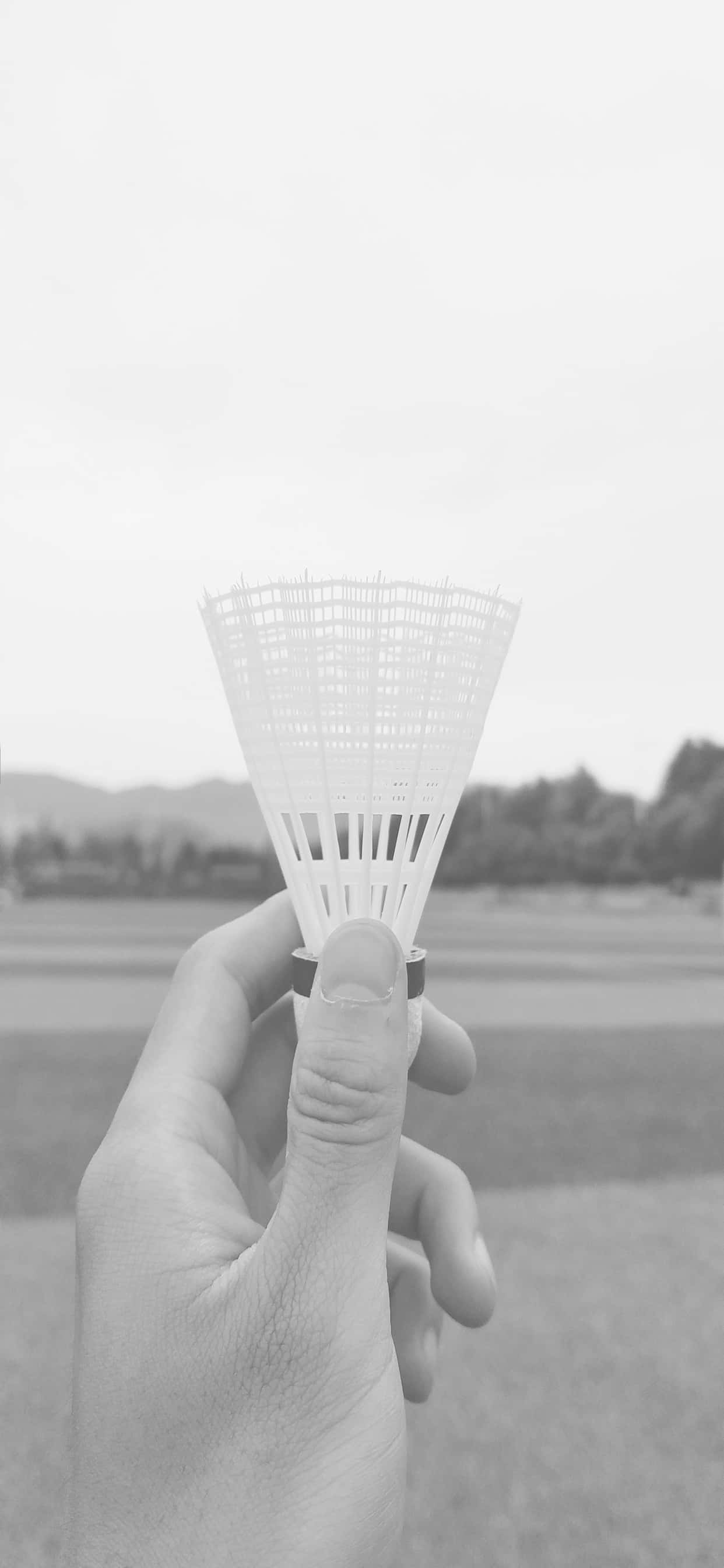 Bucură-te de jocul de badminton cu cel mai nou iPhone Xs Max! Fundal