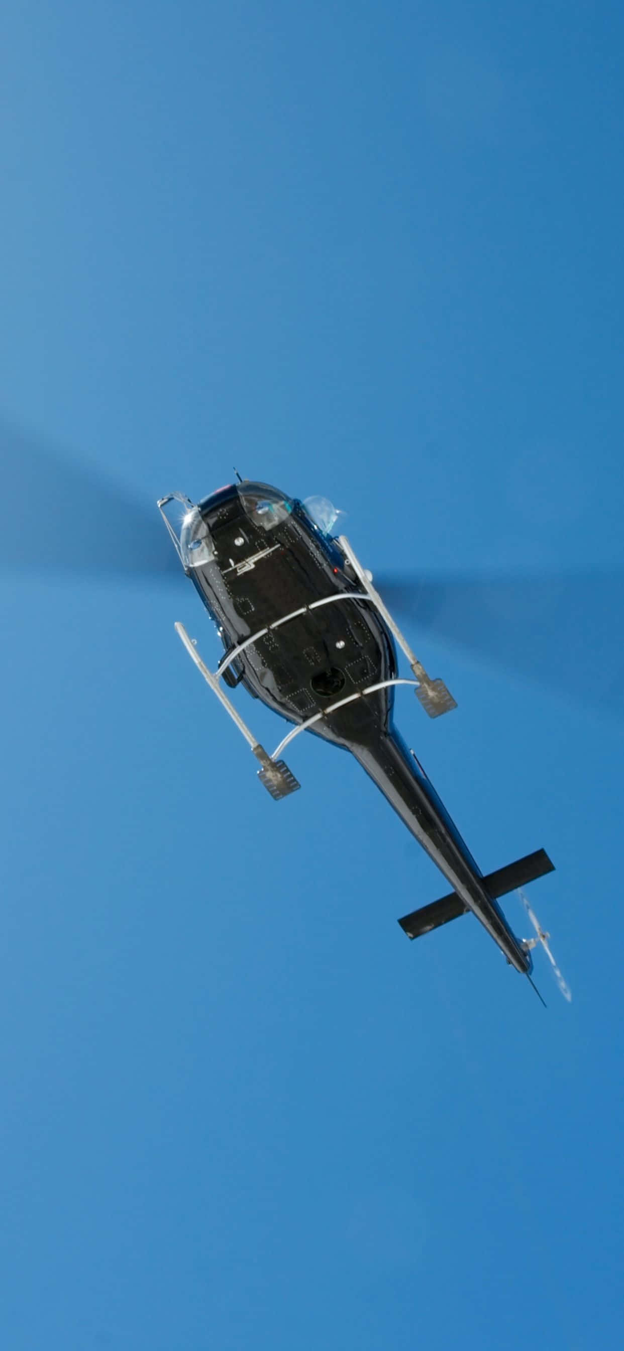 Bucură-te de vederi spectaculare ale cerului într-un Elicopter iPhone Xs Max! Fundal