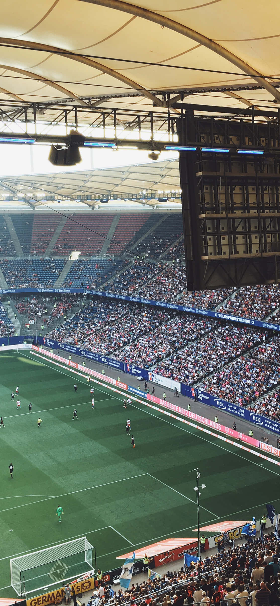 Bucurați-vă de atmosfera electrizantă a Stadionului de Fotbal Fundal