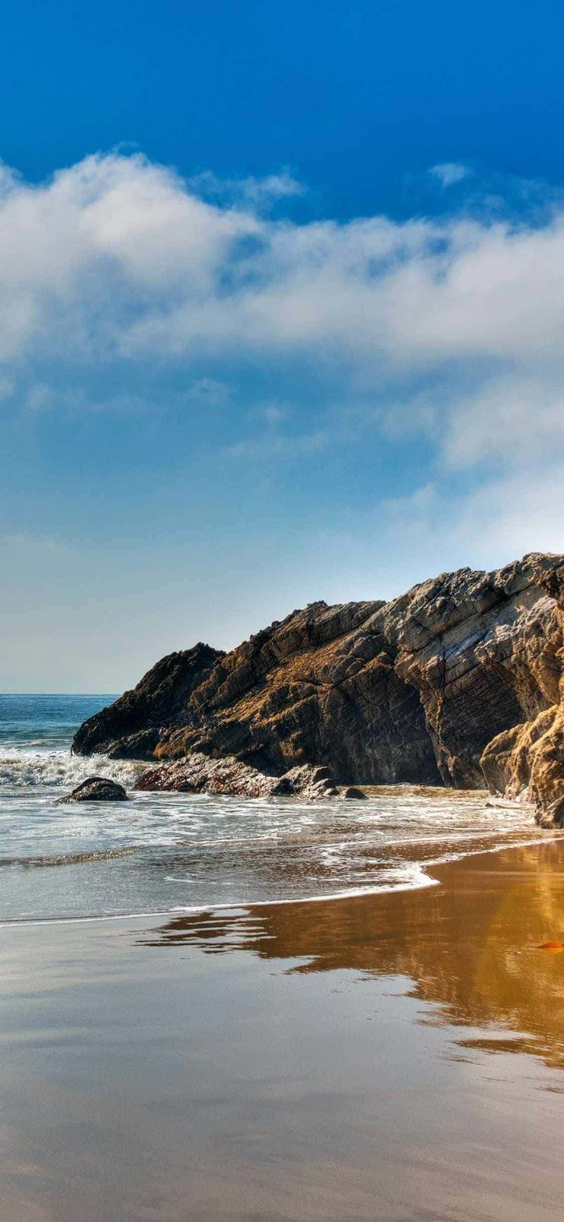 Bucurați-vă de o vedere oceană minunată cu iPhone Xs Malibu Fundal