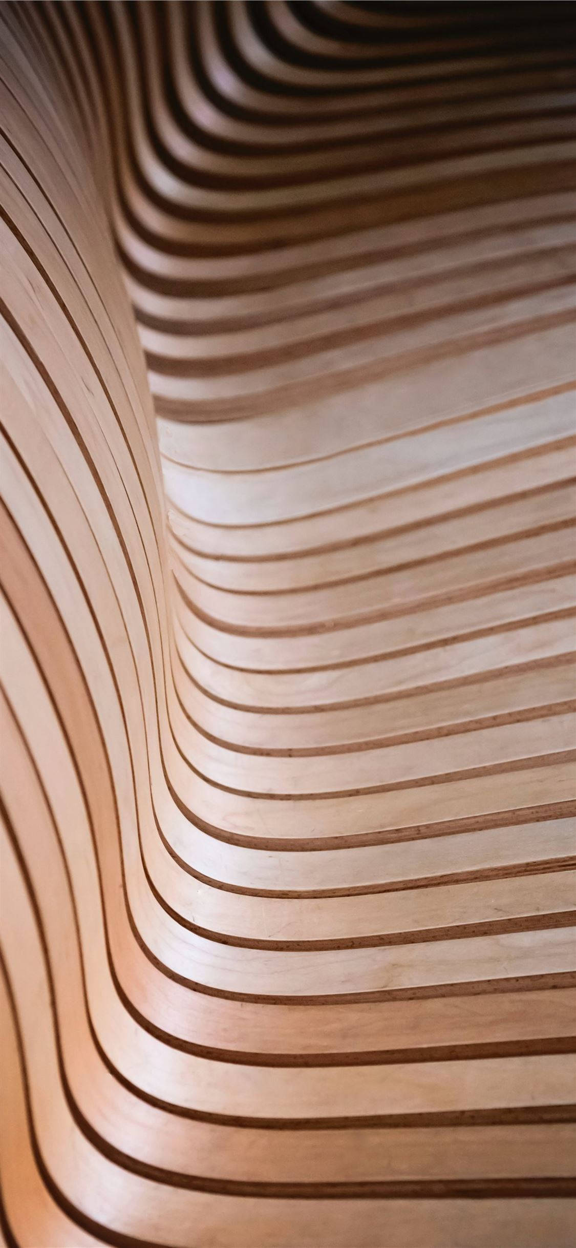 Bucurați-vă de un Stil de Design Seamless și Modern cu un iPhone Beige Fundal