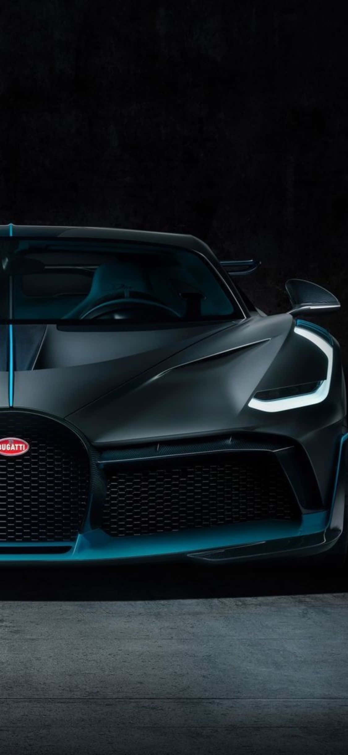 bugatti chiron este prezentat într-o cameră întunecată Fundal