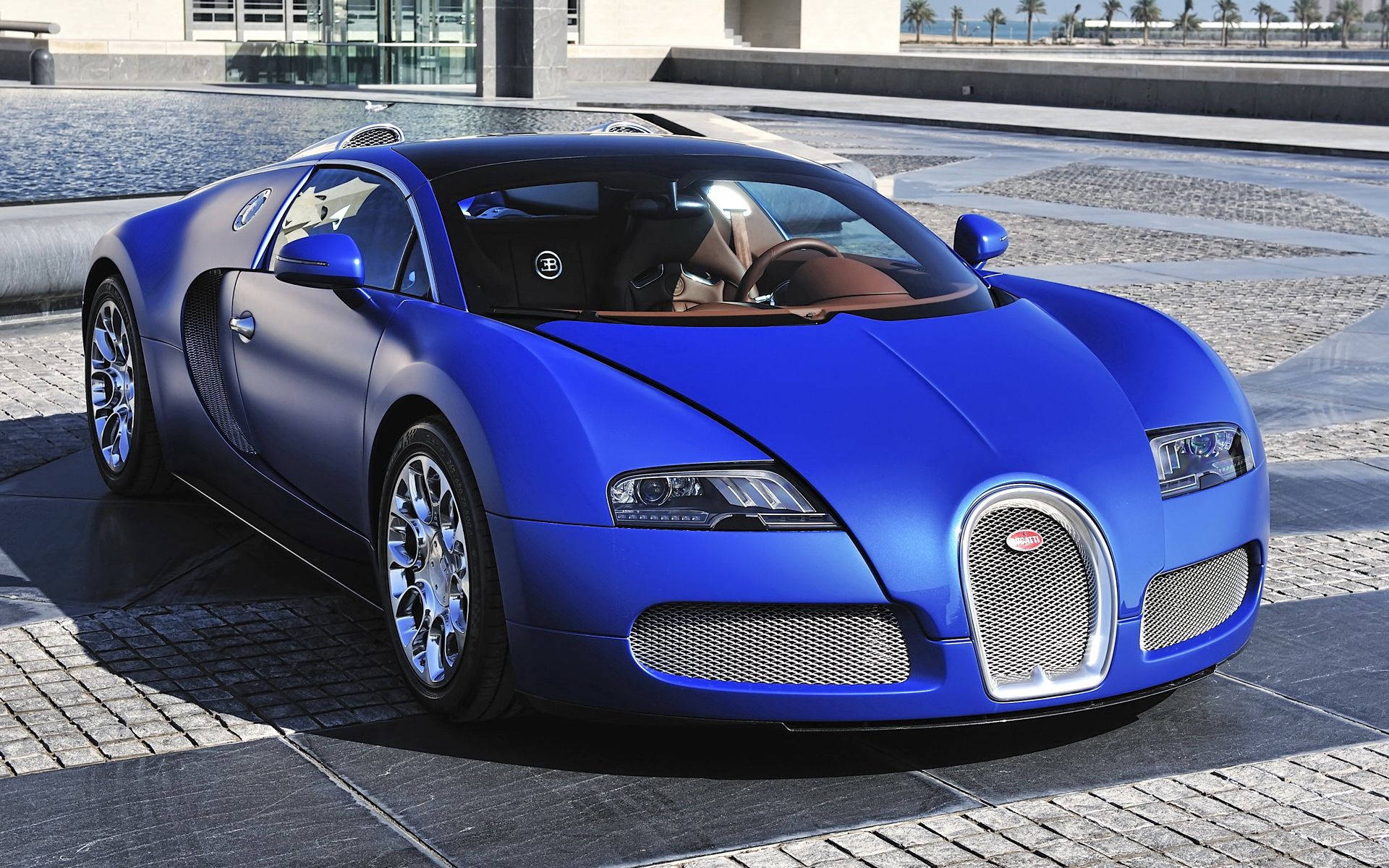 Bugatti Veyron Majestuoasă în Bleu Safir Fundal