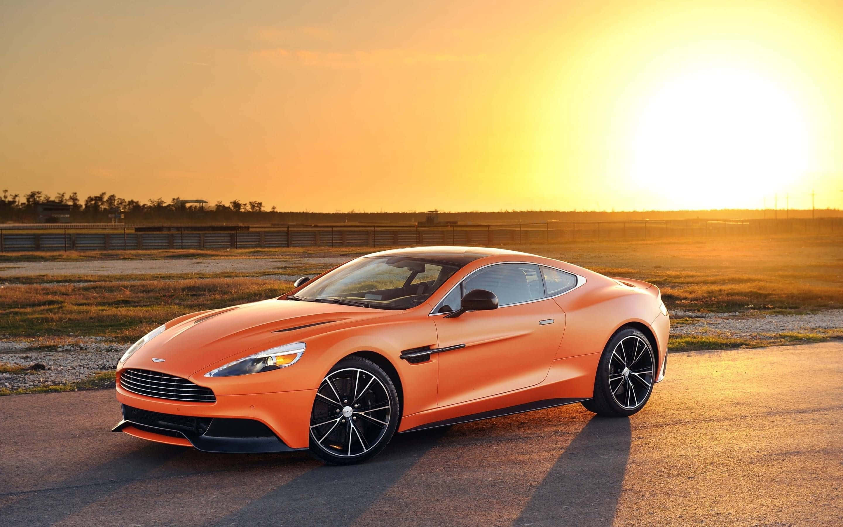 Captivant Aston Martin Vanquish în Mișcare Fundal