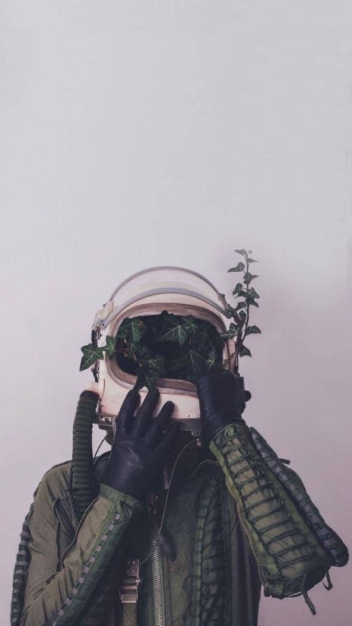 Căști de astronaut cu plantă, estetică Fundal
