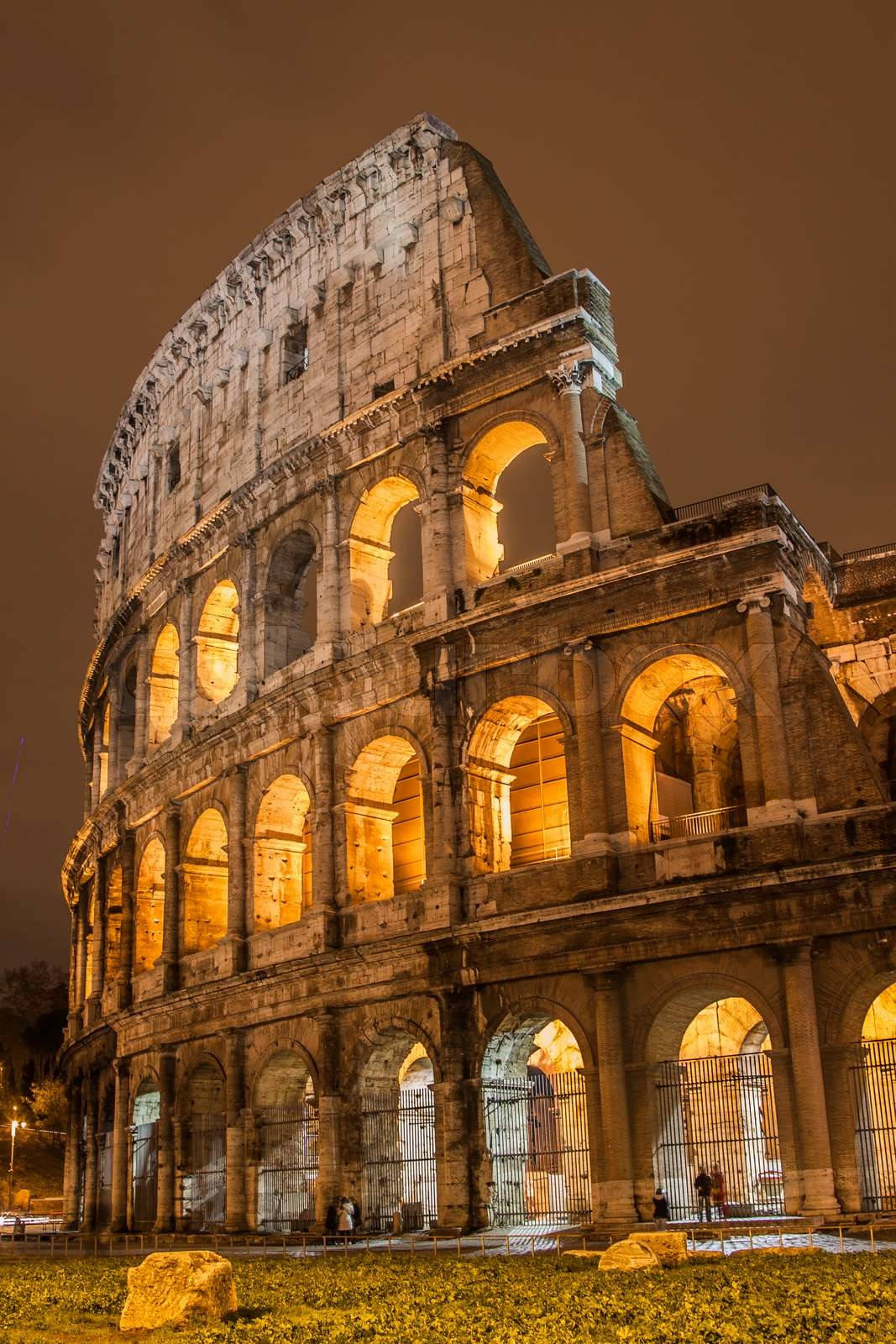 Colosseum roman iluminat, estetică maro Fundal