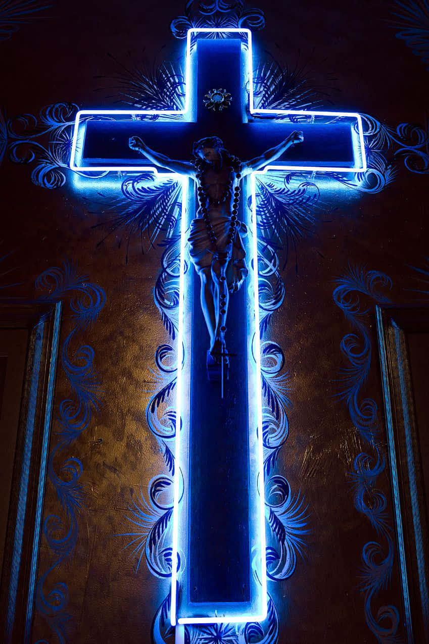 Cruce cu neon albastru cu Iisus Hristos Fundal