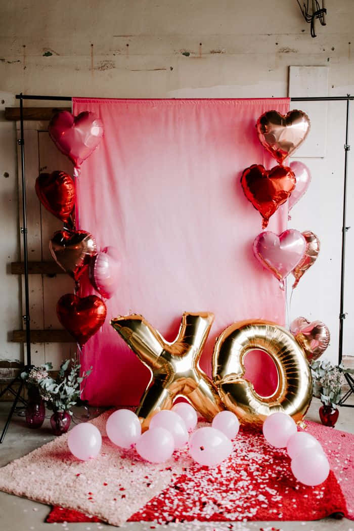 Decoratiuni de Valentine's Day cu baloane XO Fundal