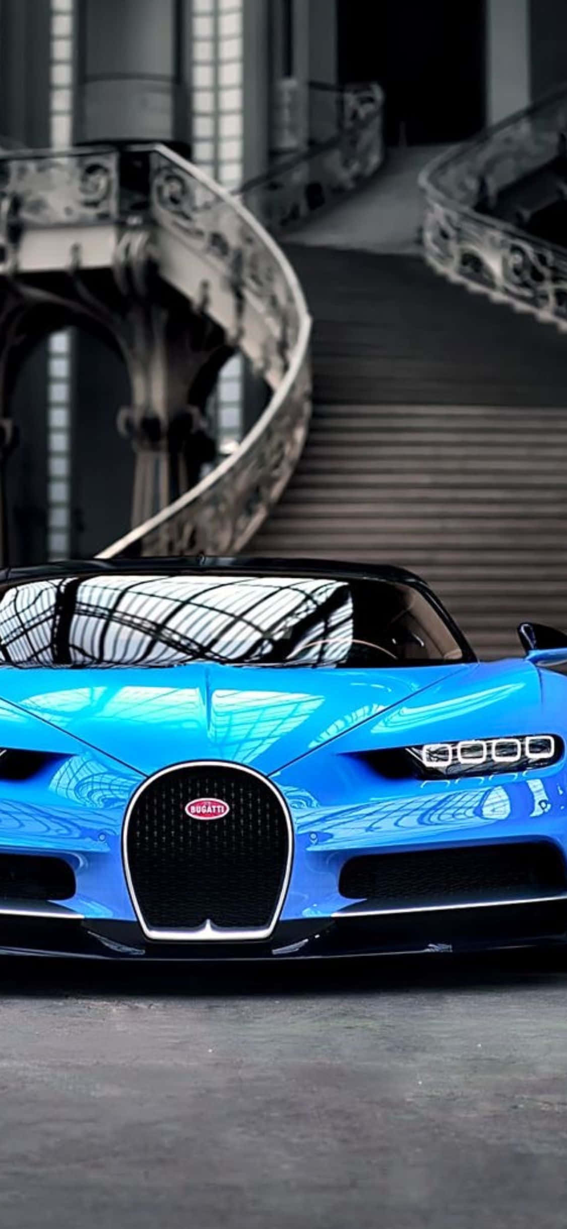 „Deține cel mai recent iPhone XS cu acest fundal elegant și sofisticat, cu design Bugatti.” Fundal