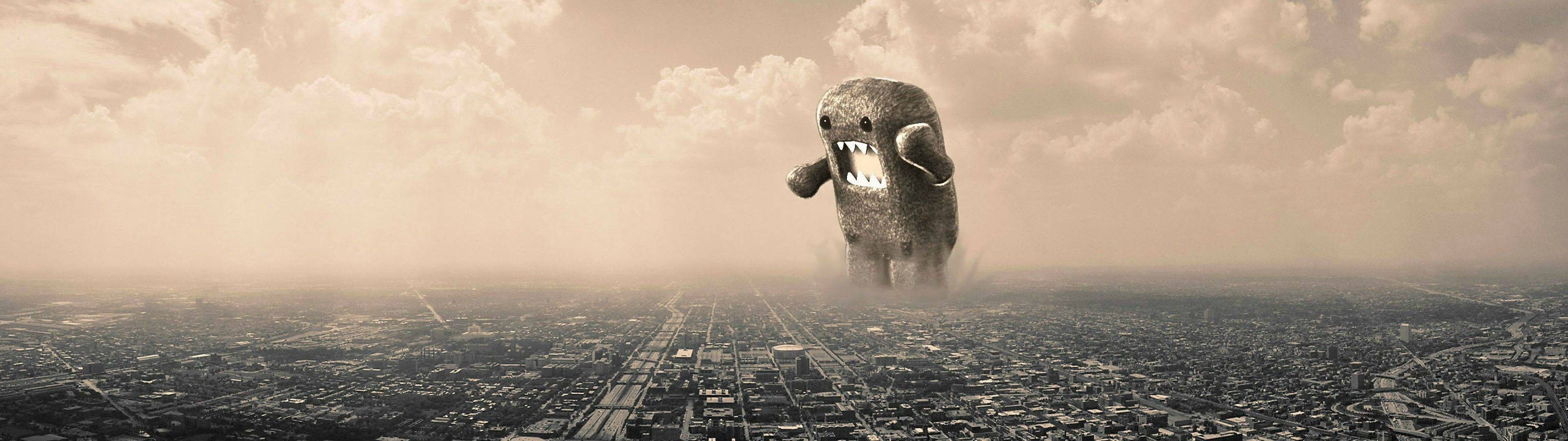 Domo Monster te întâmpină în lumea dual monitor Fundal
