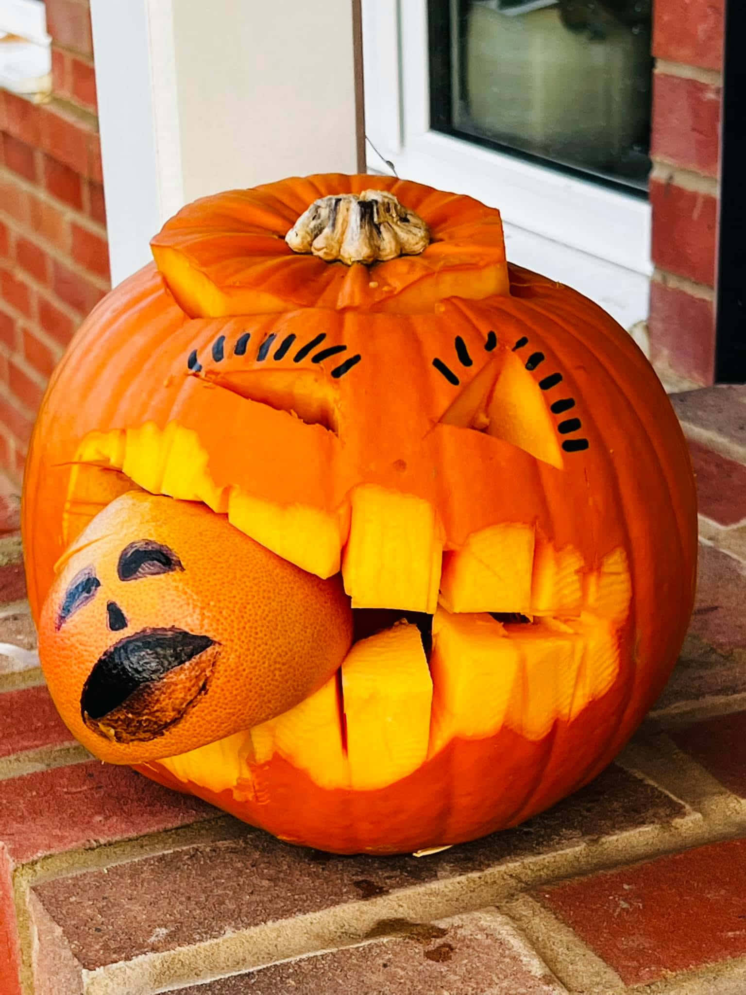 Dovleac de Halloween cu monstru înfricoșător Fundal