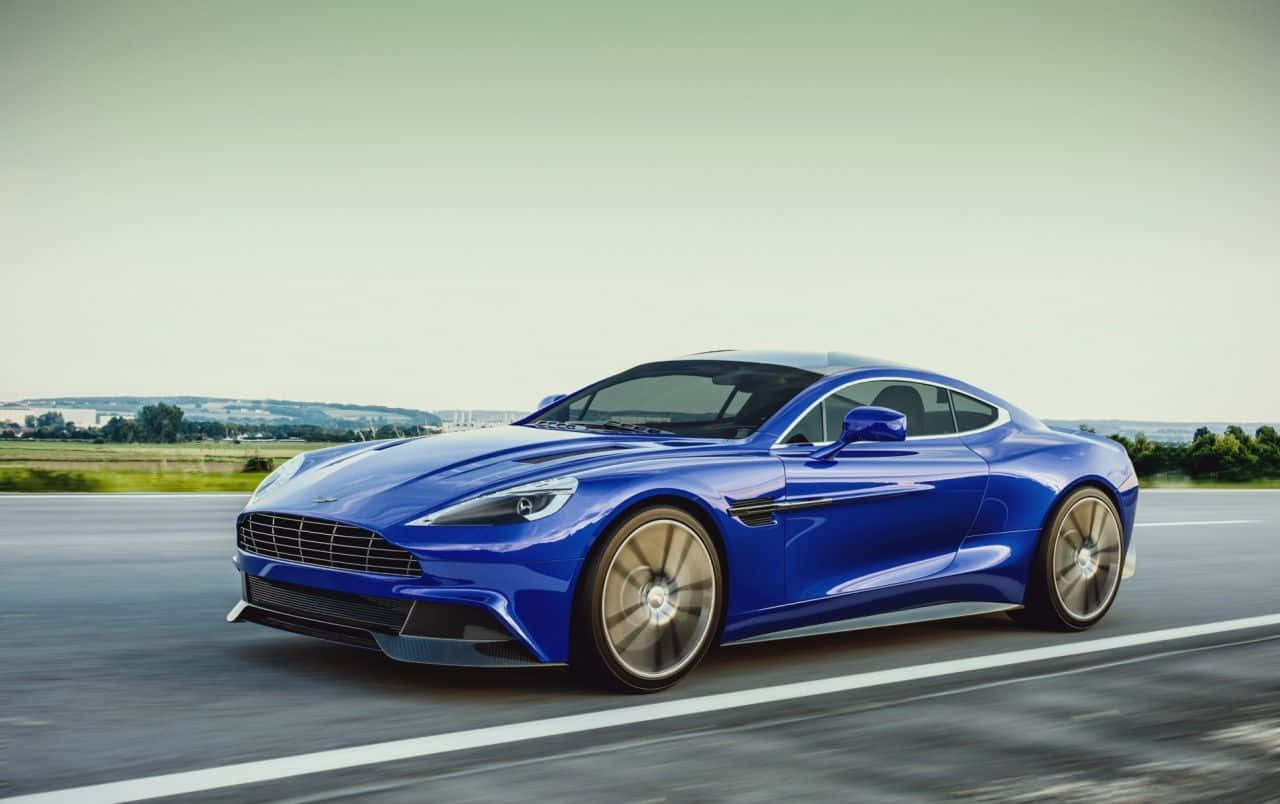 Experimentați Puterea și Eleganța Aston Martin Vanquish Fundal