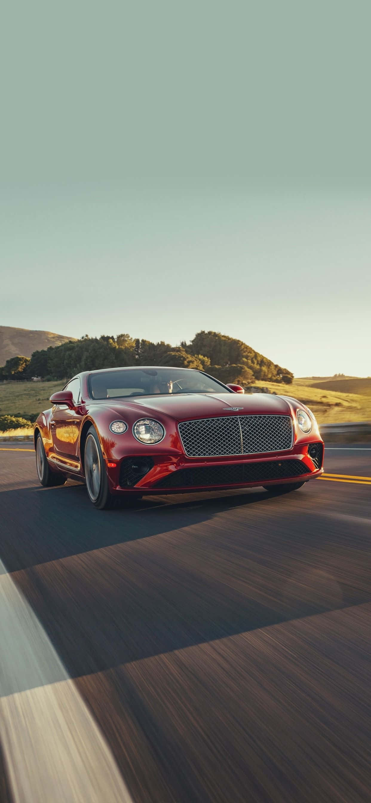 Experimentează luxul cu noul iPhone Xs Max și Bentley. Fundal