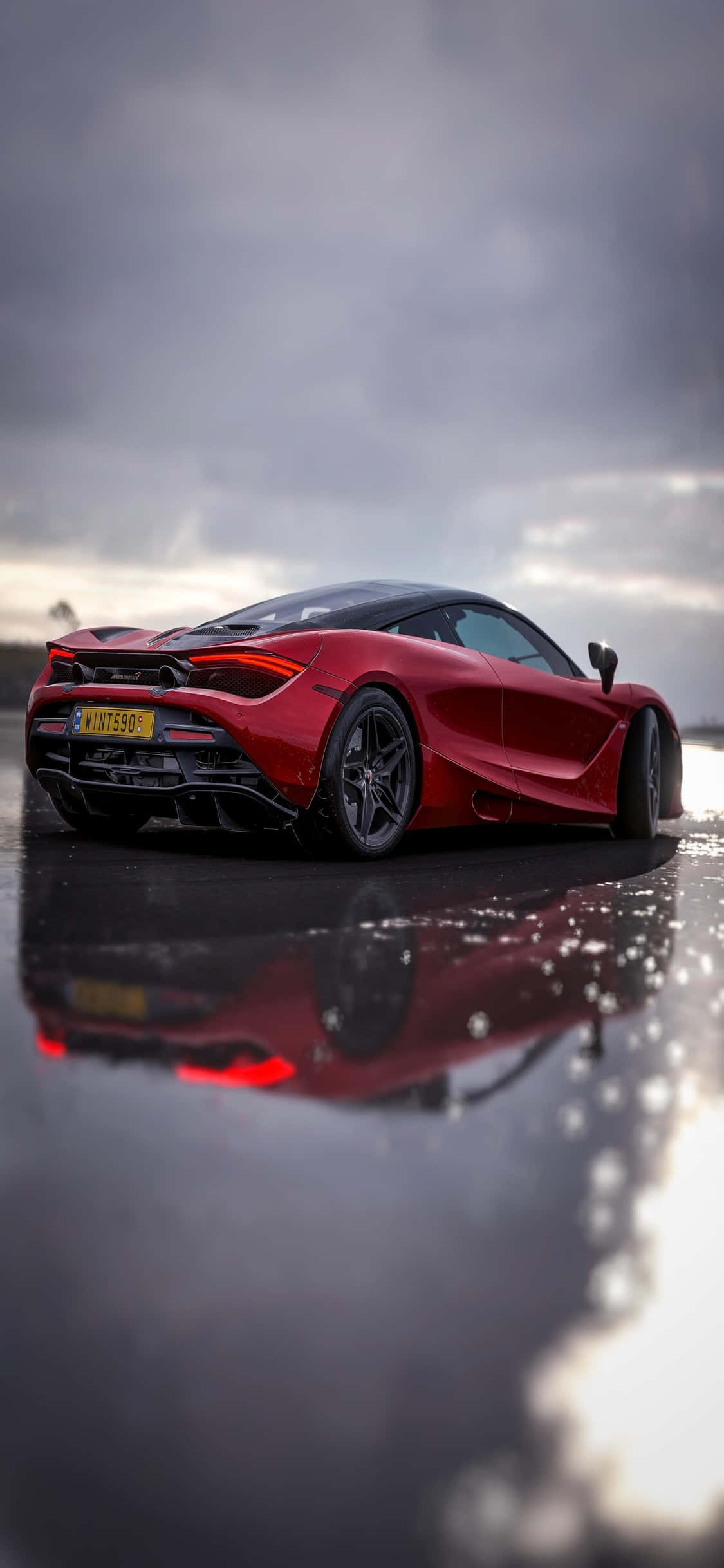 Experimentați Viteza și Luxul iPhone Xs McLaren 720s Fundal