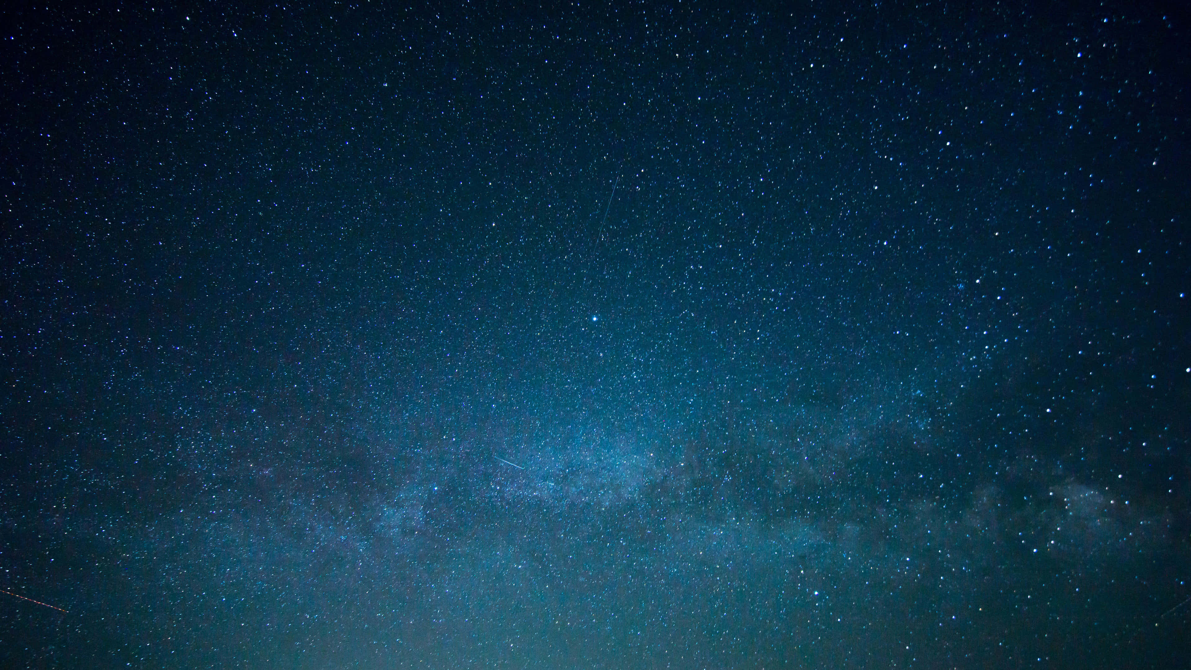 Explorează adâncimile universului cu acest fundal spațial 4K Fundal