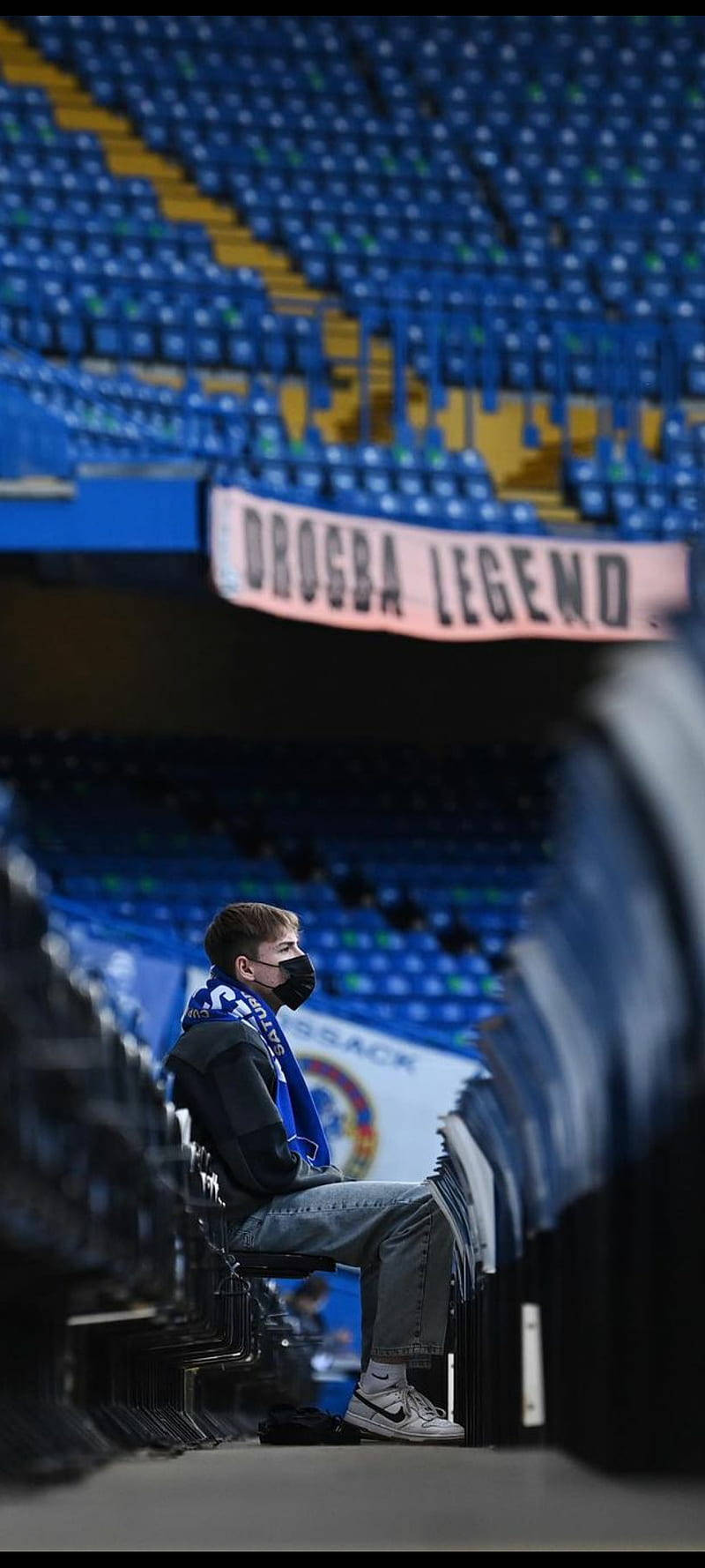 Fan Pasionat în Stamford Stadium Fundal