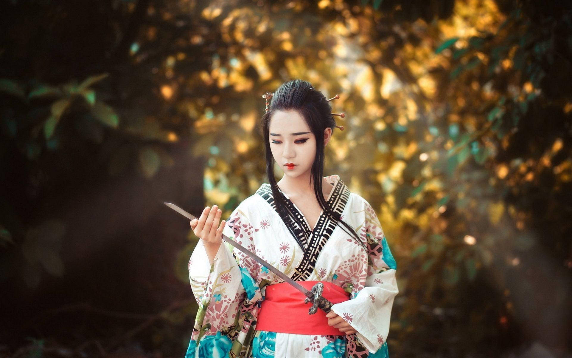 Fata japoneză cu sabie Fundal