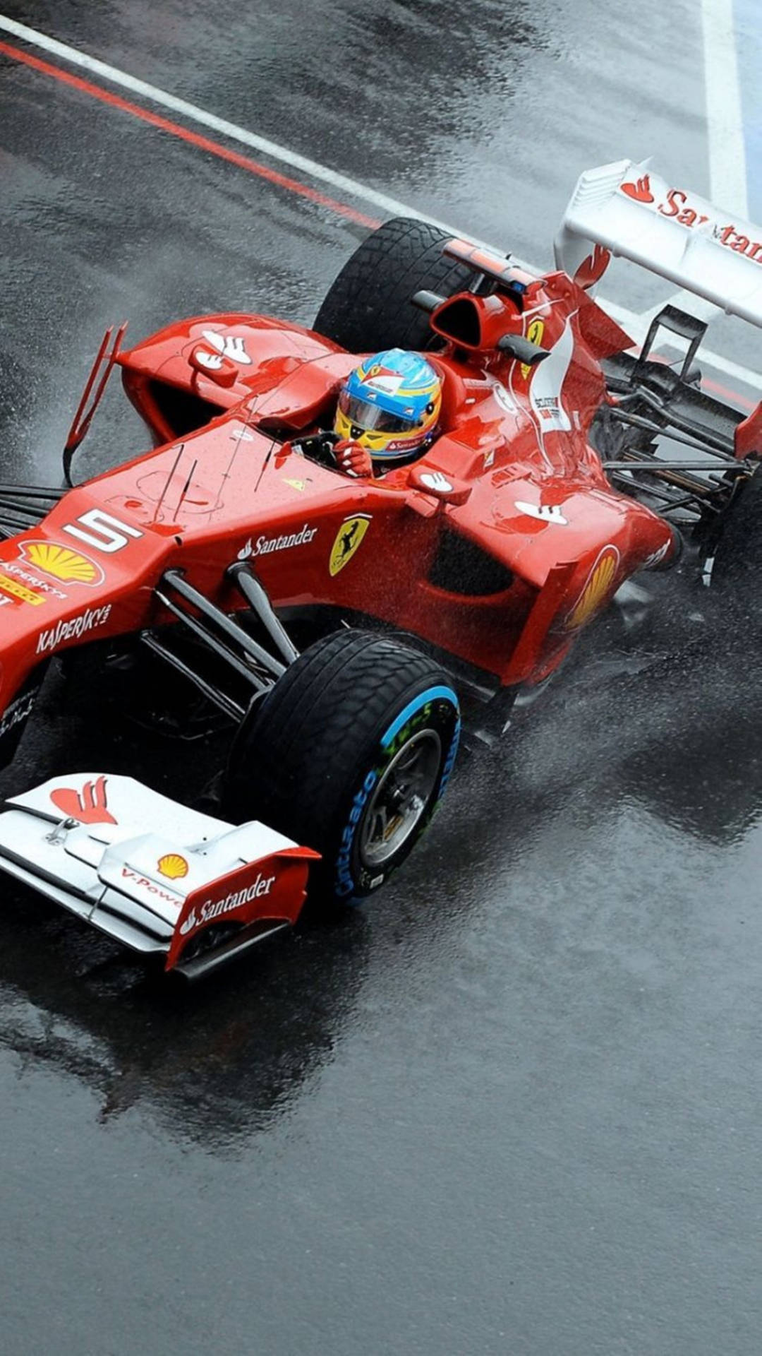 Fernando Alonso pe telefon roșu Ferrari Fundal