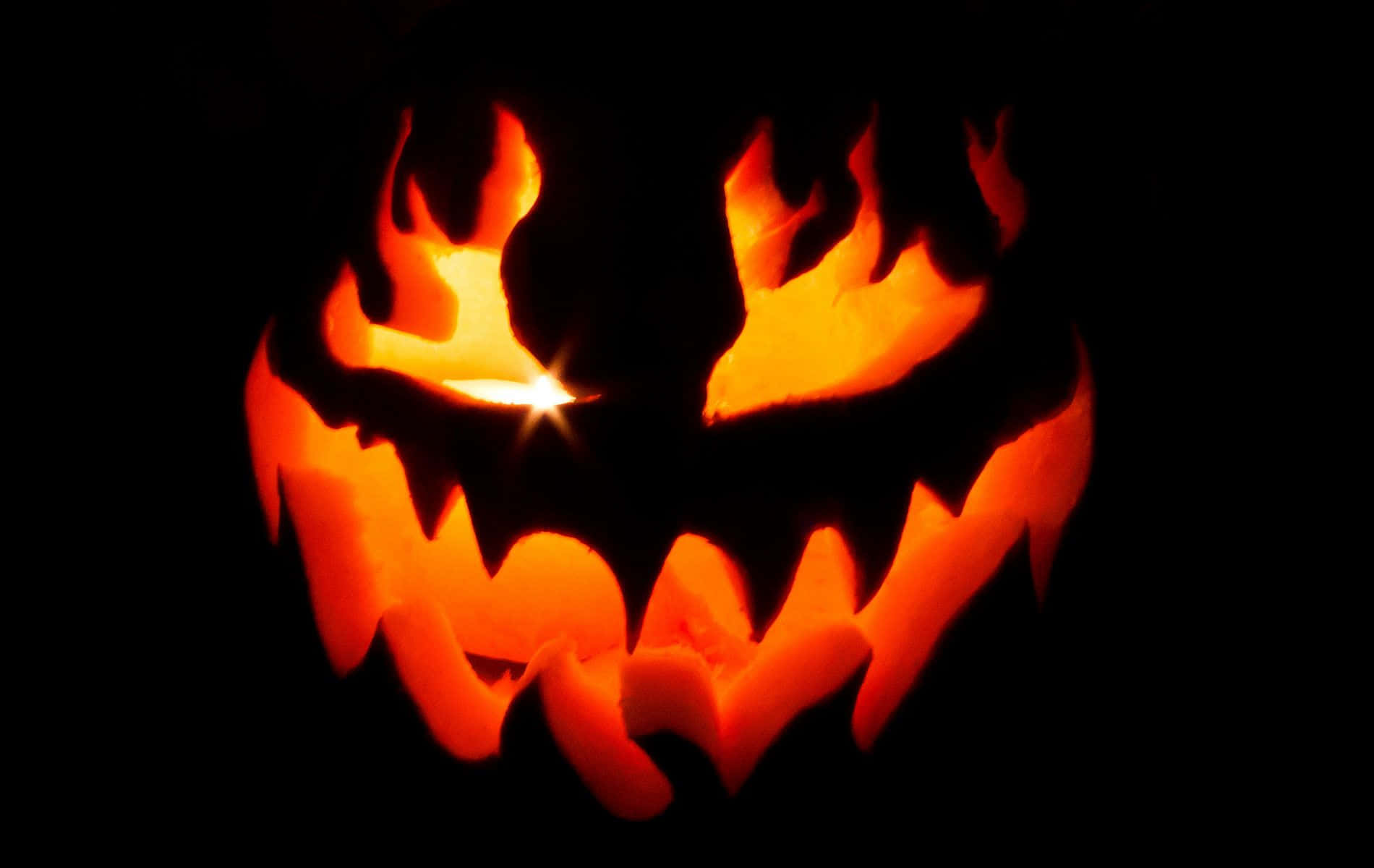 Fundal de Halloween cu dovleac și lumânare strălucitoare Fundal