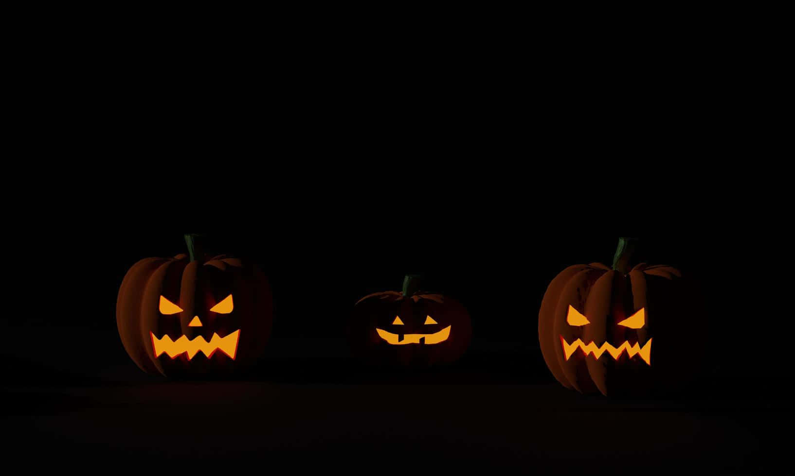 Fundal Întunecat cu Trei Dovleci de Halloween Fundal