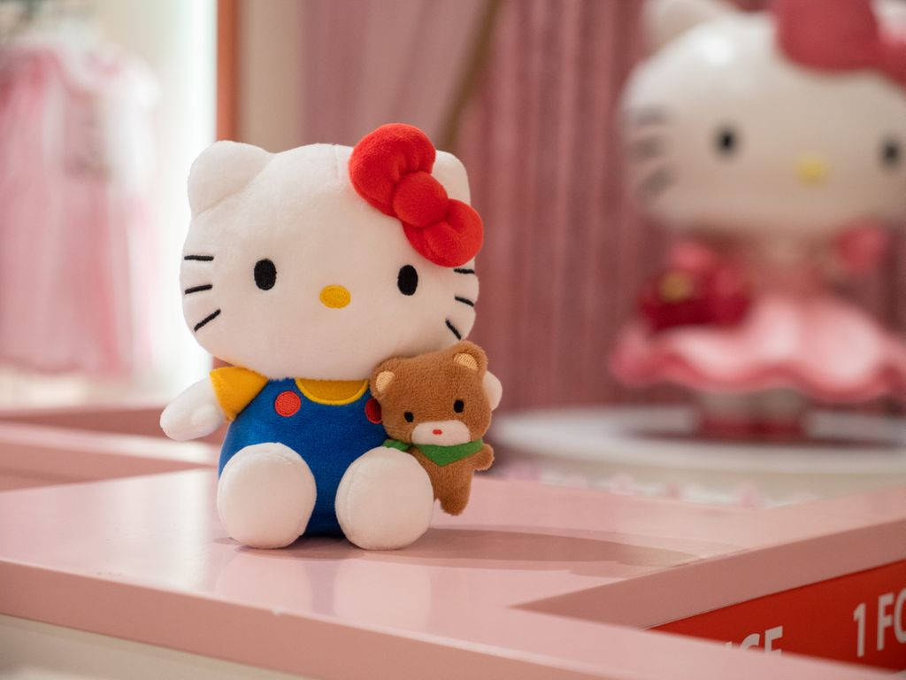 Hello Kitty de Plush Caricatural Drăguț Fundal