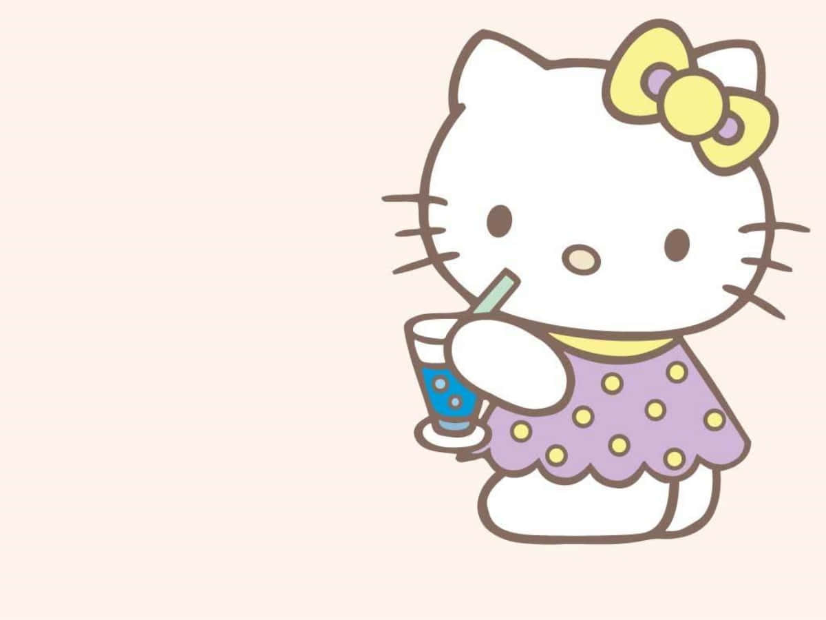 Hello Kitty Sorbind o Băutură pe Laptop Fundal