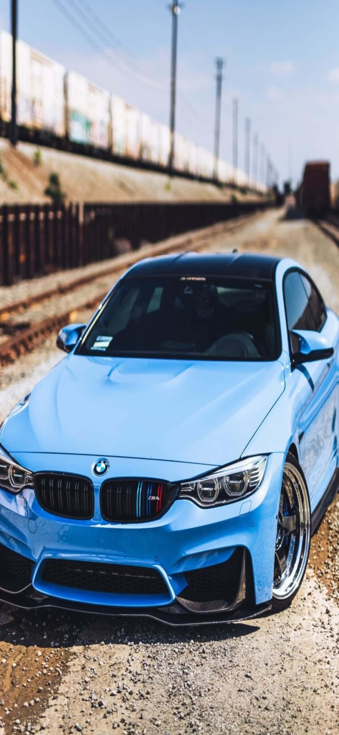 High-Tech & Luxurious. The iPhone X and a sleek BMW together. Fundal