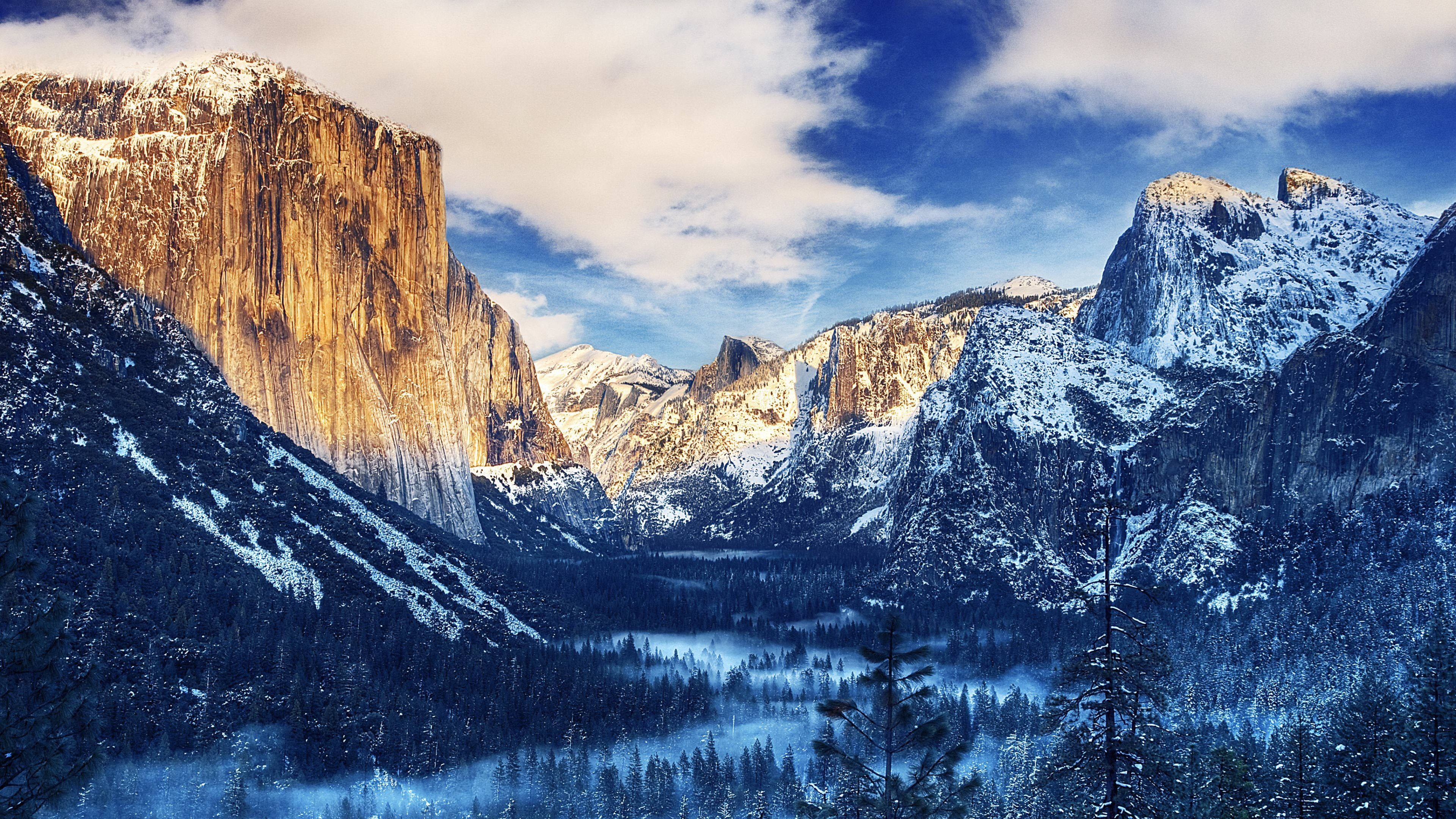 Imaginea Uimitoare a Văii Yosemite Acoperite de Zăpadă Fundal