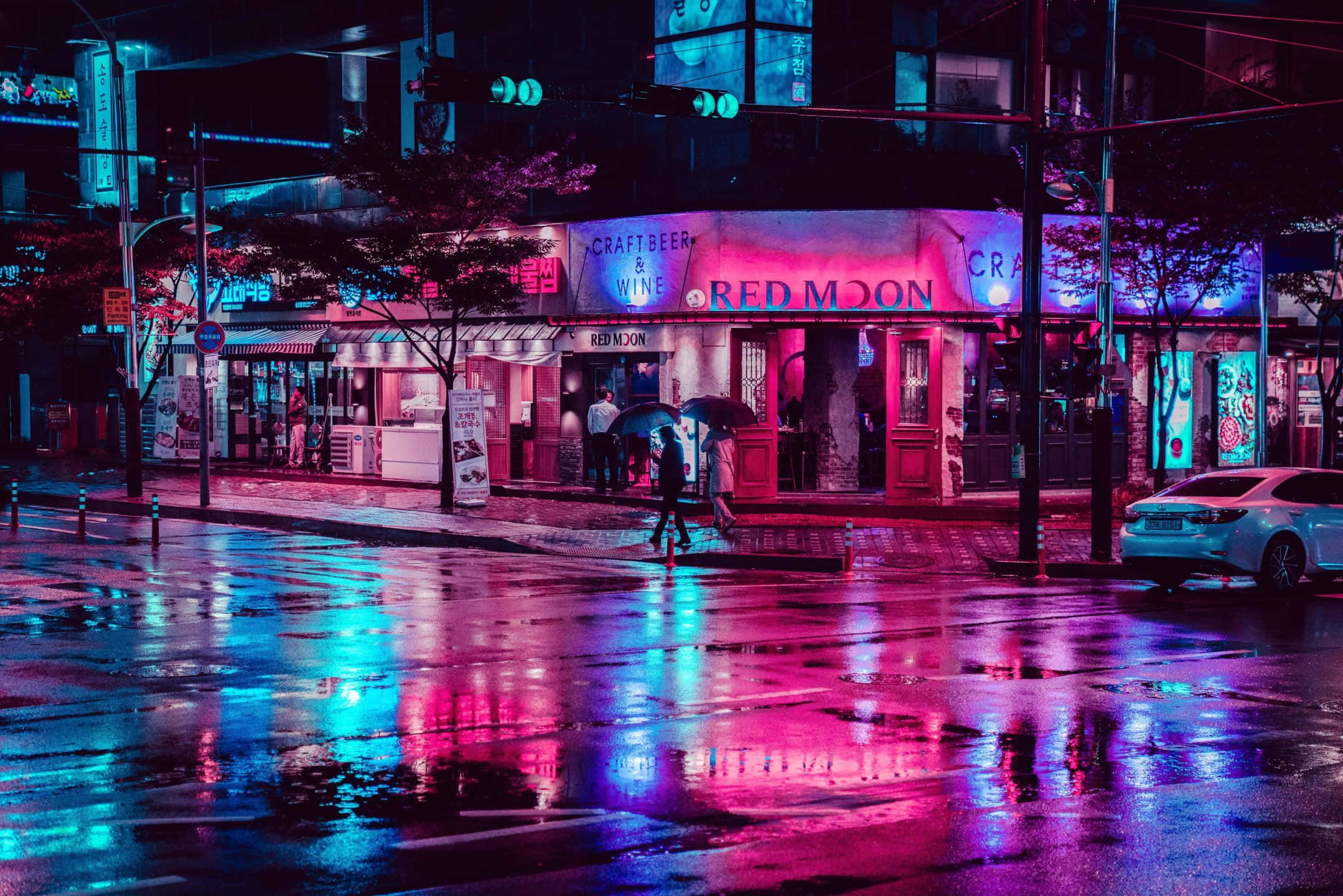Imersionează-te în peisajele vibrante ale Orașului Neon. Fundal