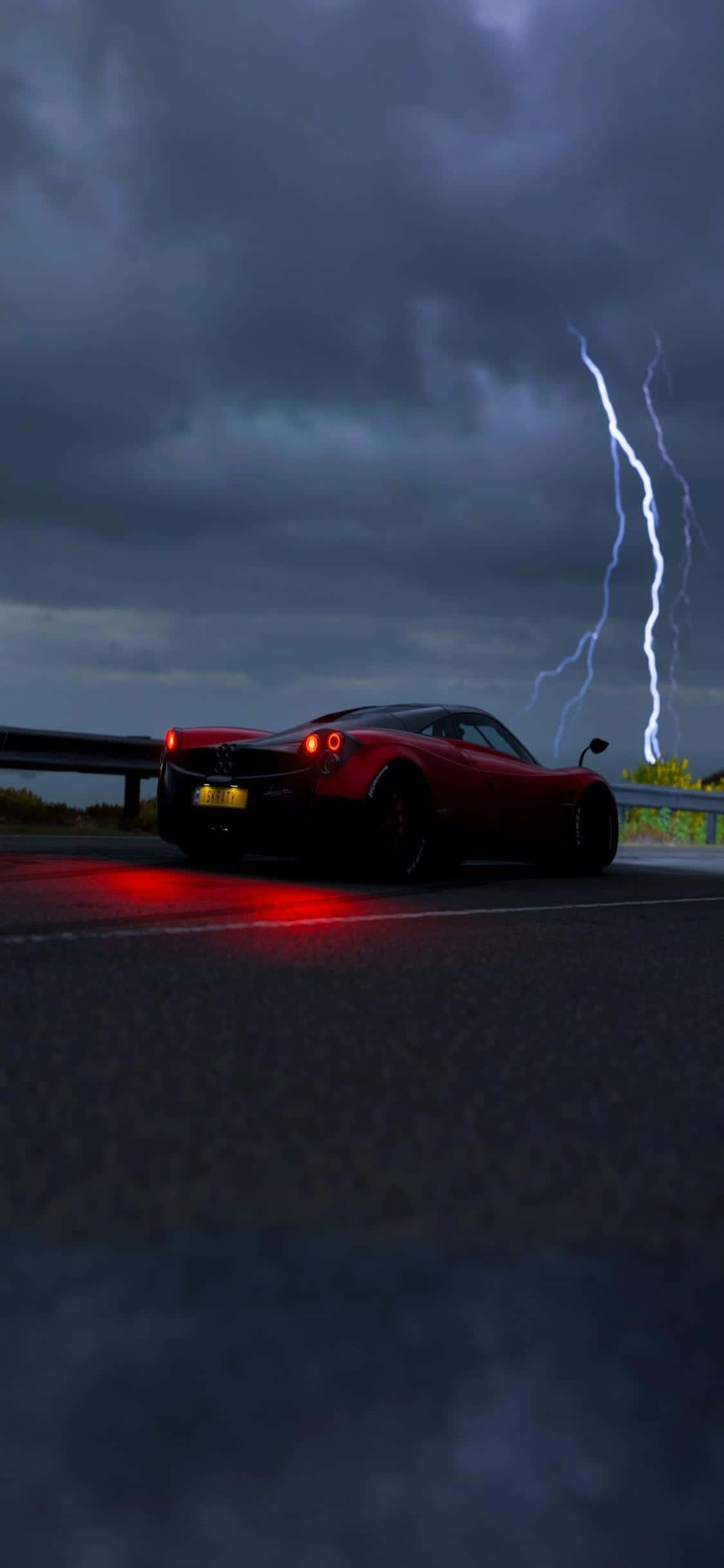 Intră în experiența supremă de curse cu Forza Horizon 4 pe iPhone Xs Fundal