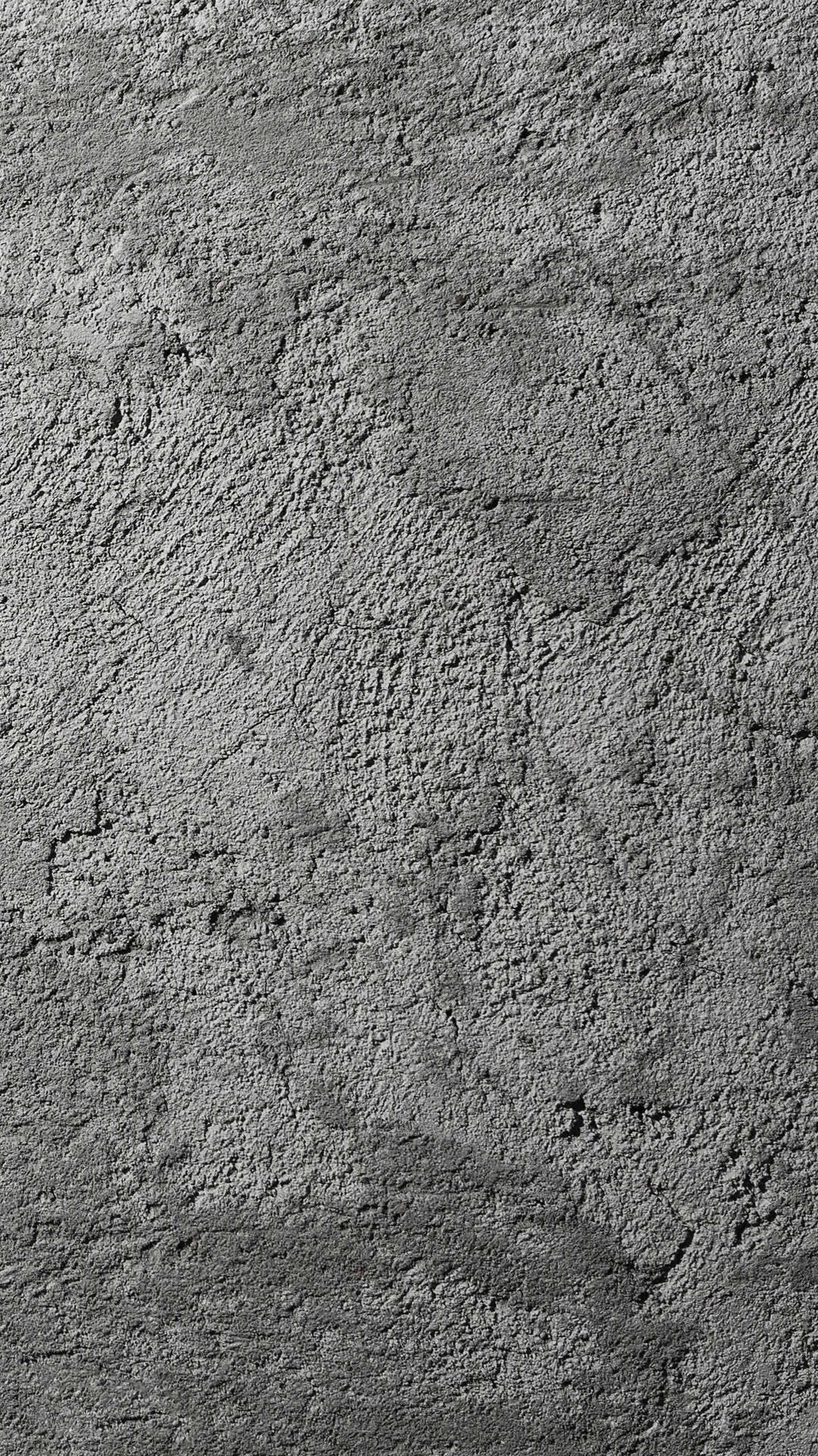 iPhone gri sofisticat pe un perete de beton aspru Fundal