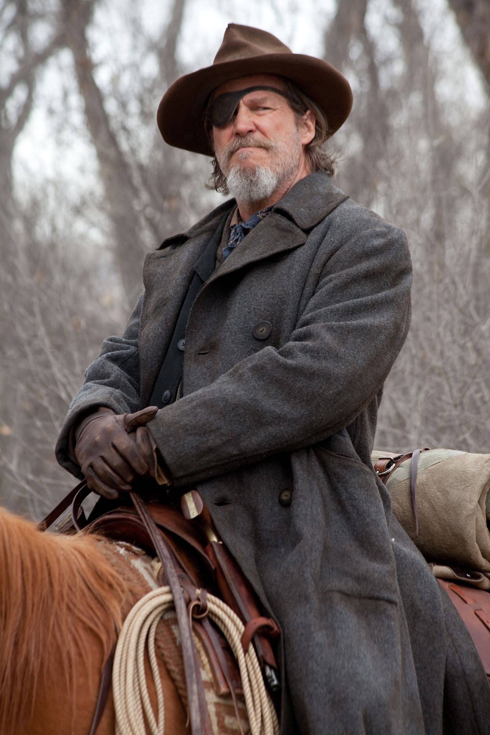 Jeff Bridges în prestația sa excepțională din filmul True Grit. Fundal