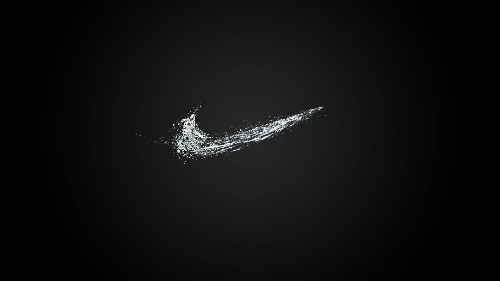 Logo Nike simplu, negru, cool, un omuleț care se uită la calculator Fundal