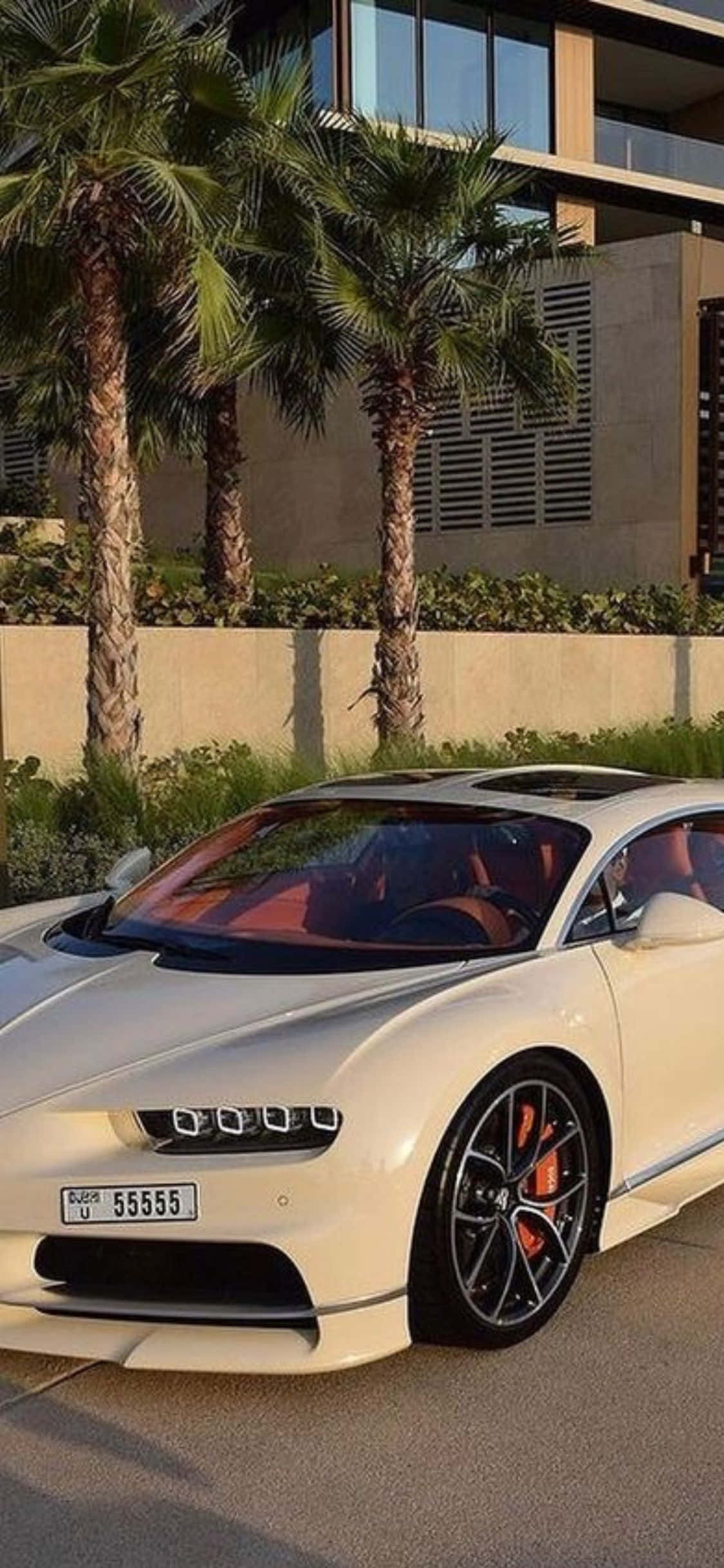 Lux optimizat: un iPhone XS și un Bugatti Veyron, perechea perfectă pentru un stil de viață luxos Fundal