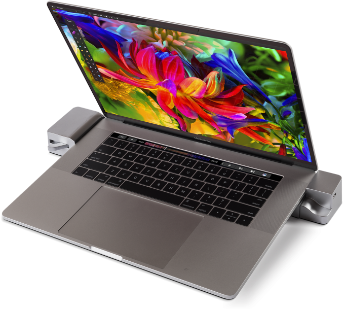 Mac Book Pro cu ecran colorat și accesorii Fundal