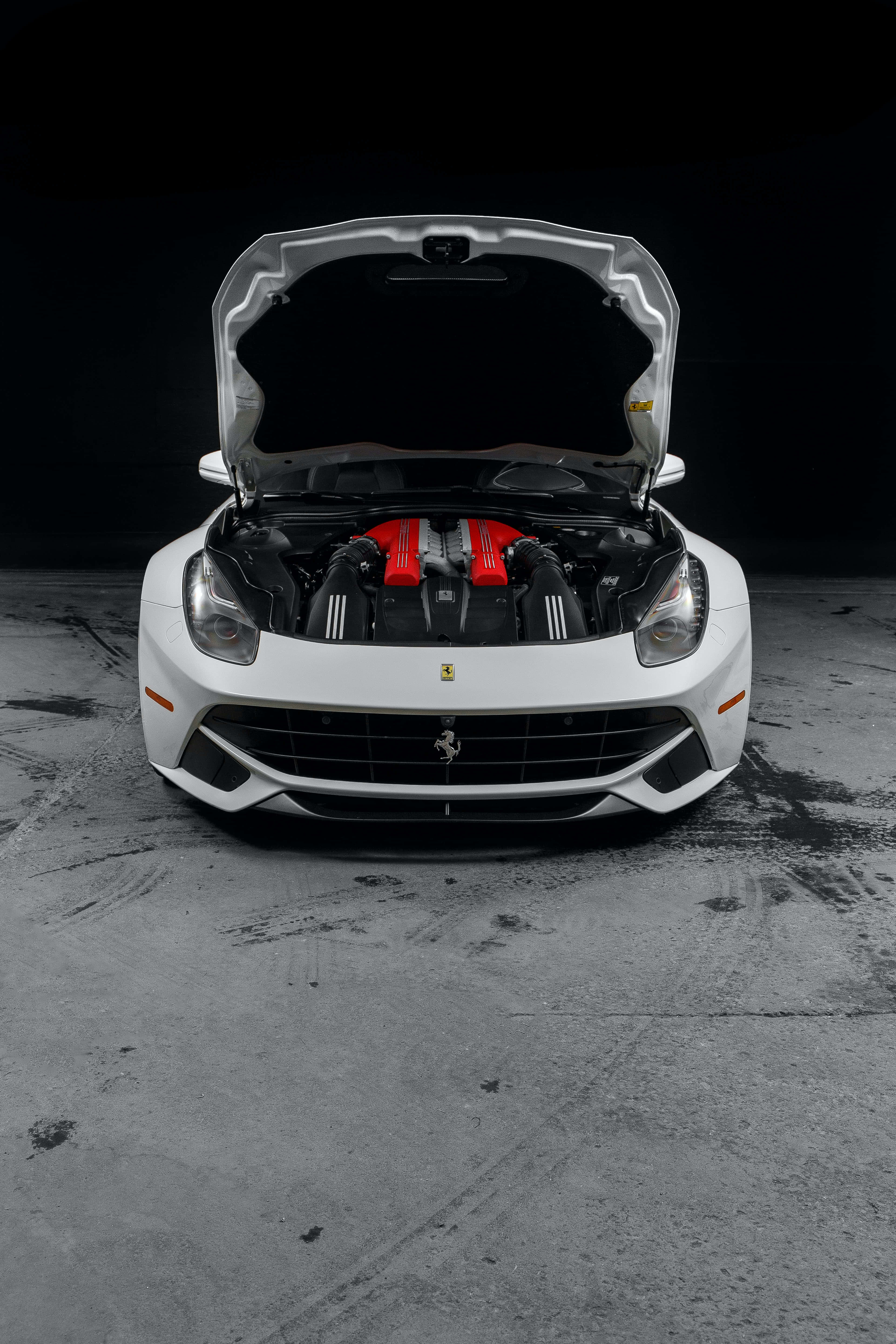 Majestic Speed-Red Ferrari Against the Dusk Sky Fundal