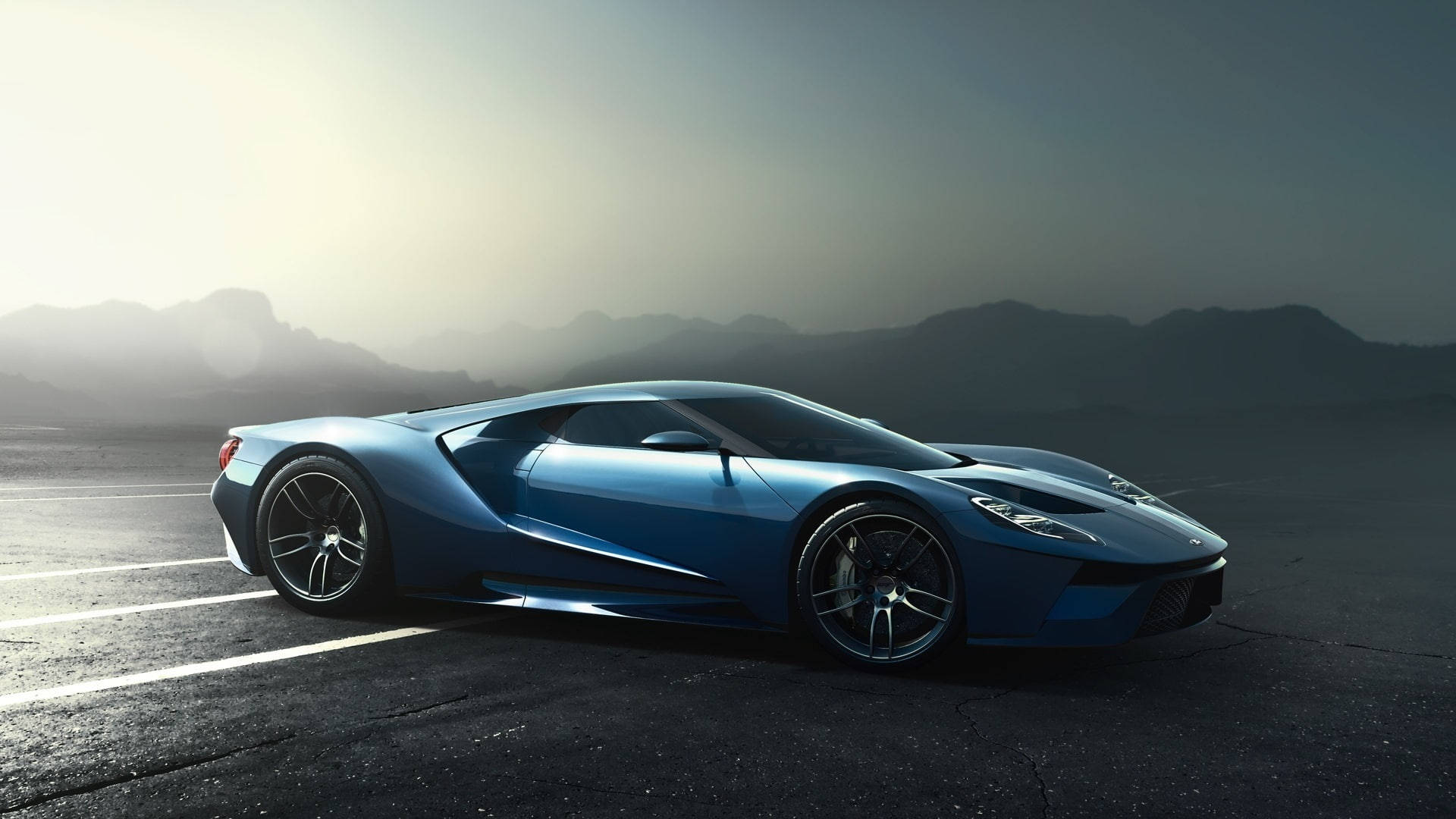 Mașină sport Ford GT de culoare azurie Fundal