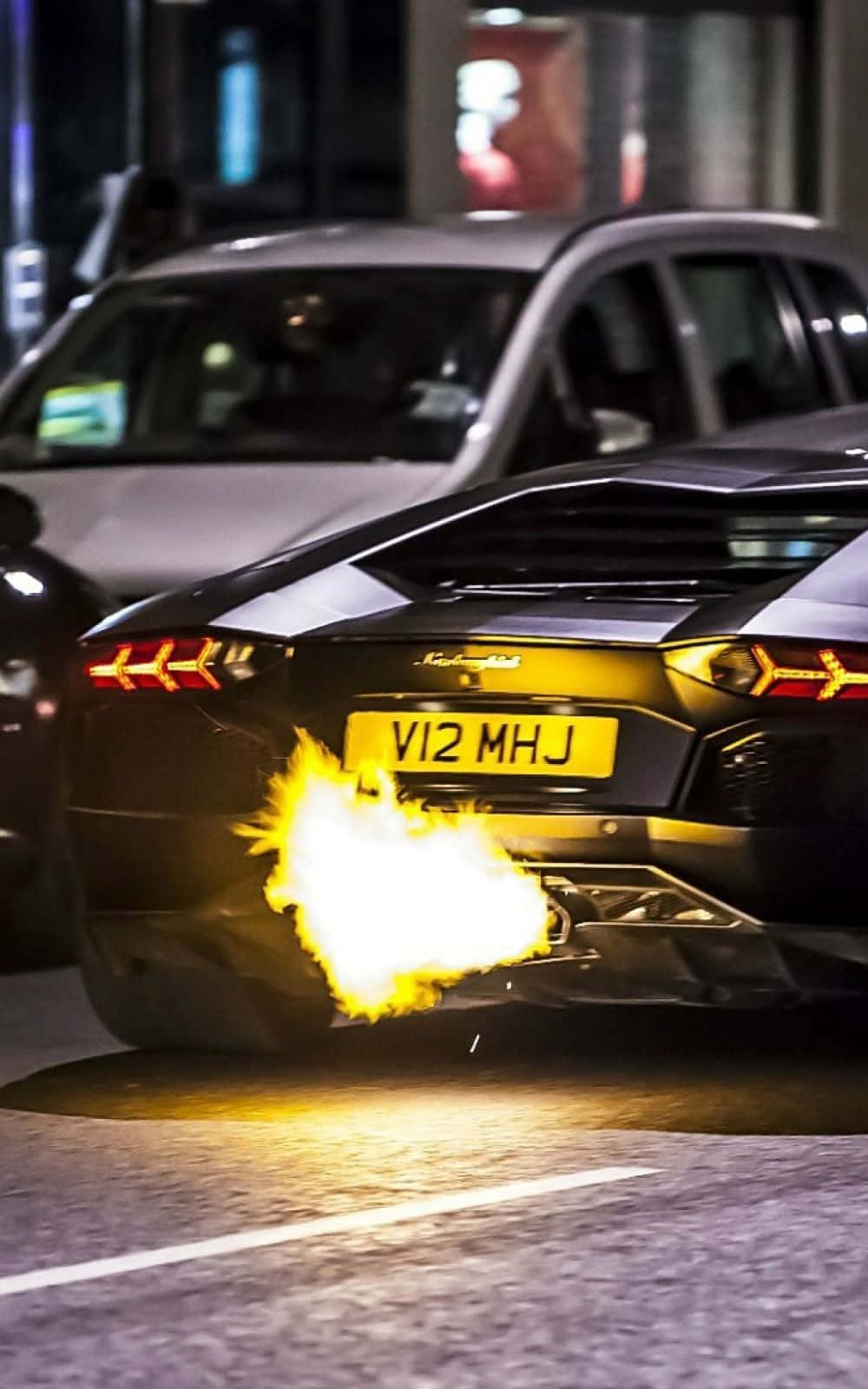 Mașină sport pe drum – Lamborghini Phone Fundal