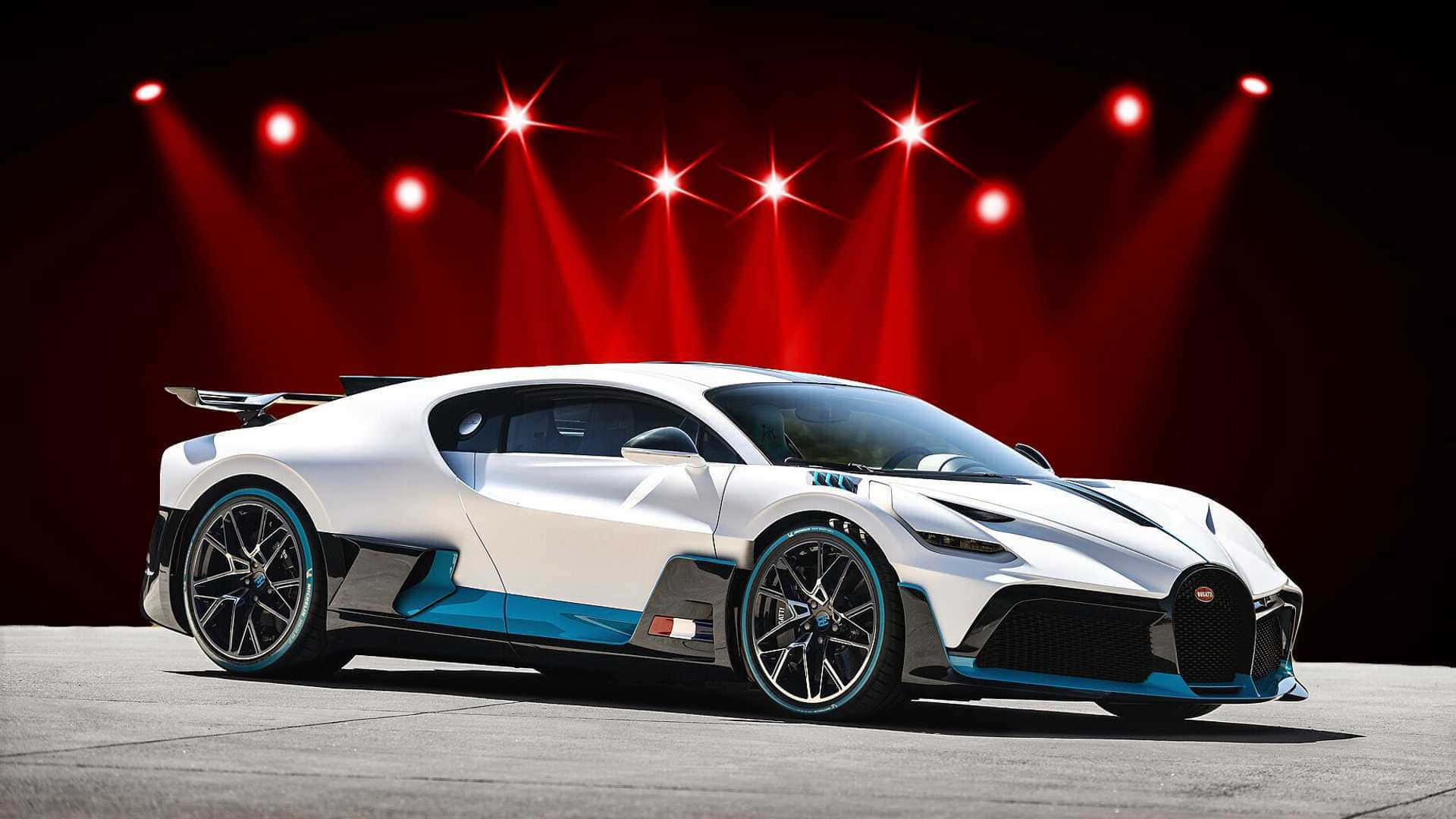 Mașină sport roșie elegantă la apus Fundal