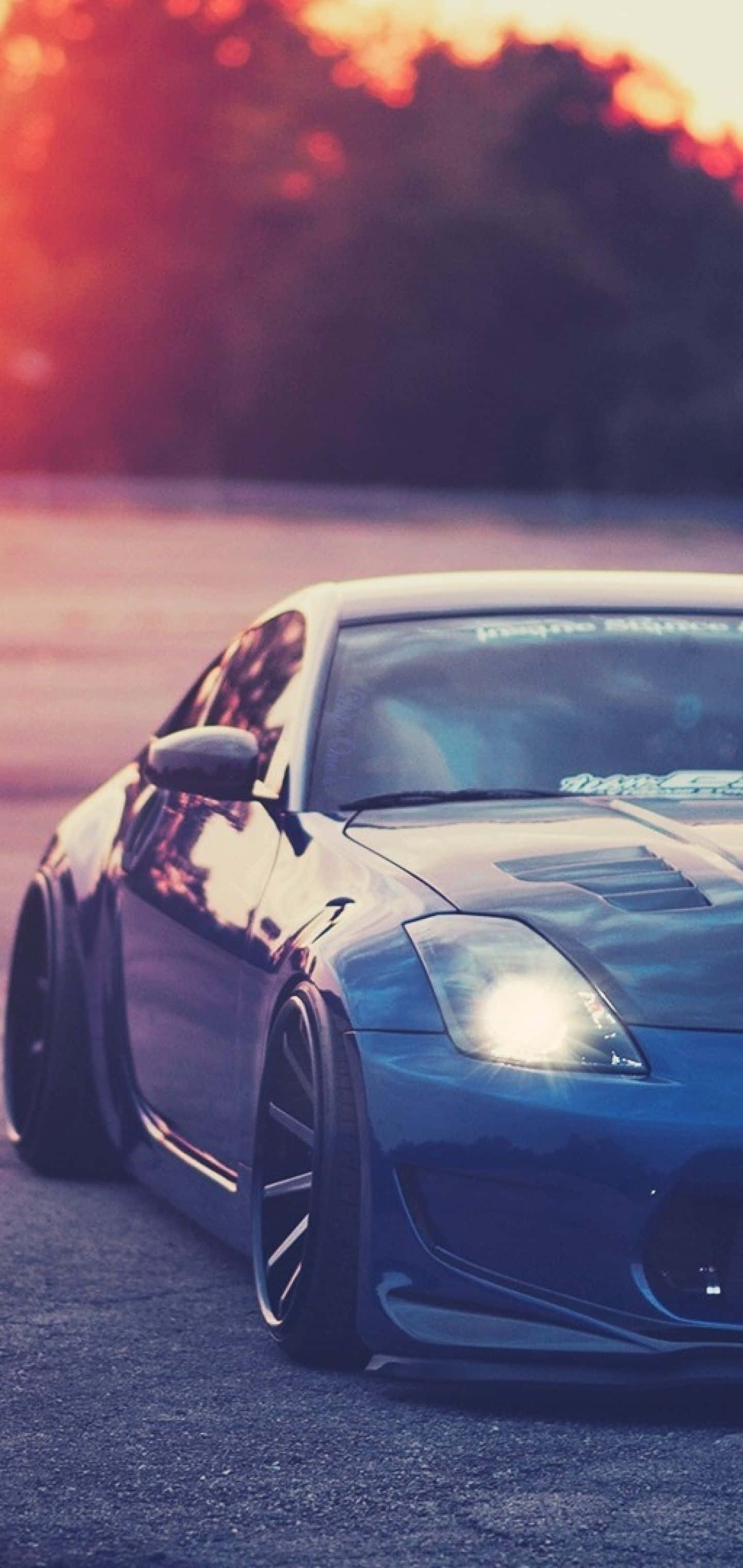 Nissan 350Z iPhone albastru metalizat Fundal