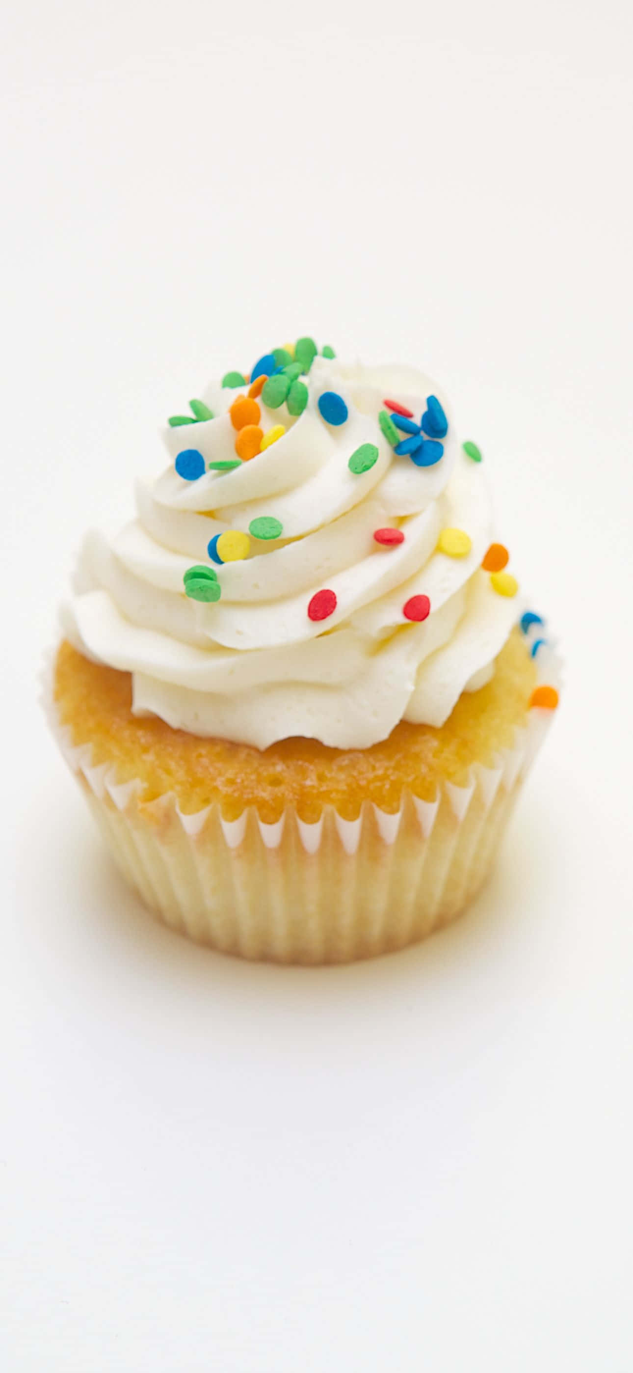 o cupcake alb cu glazură albă Fundal