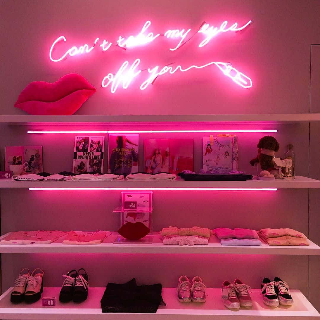 O estetică vibrantă și atrăgătoare în roz neon Fundal