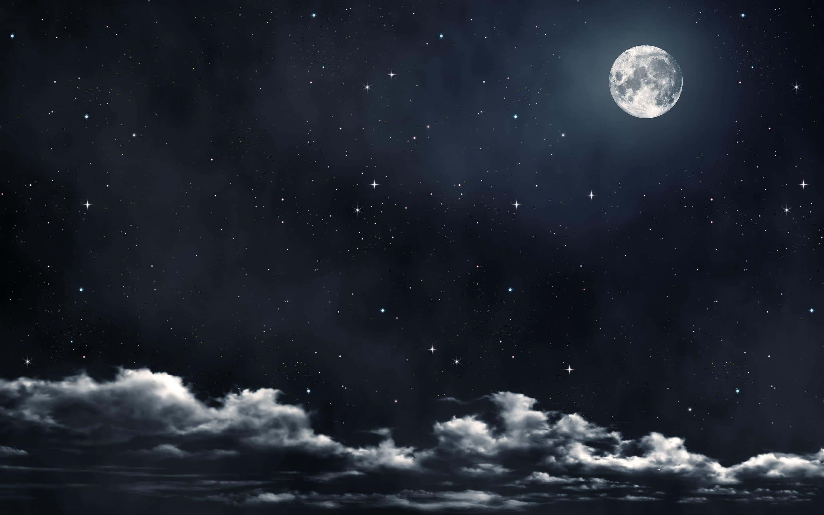 o imagine alb-negru cu luna și norii Fundal