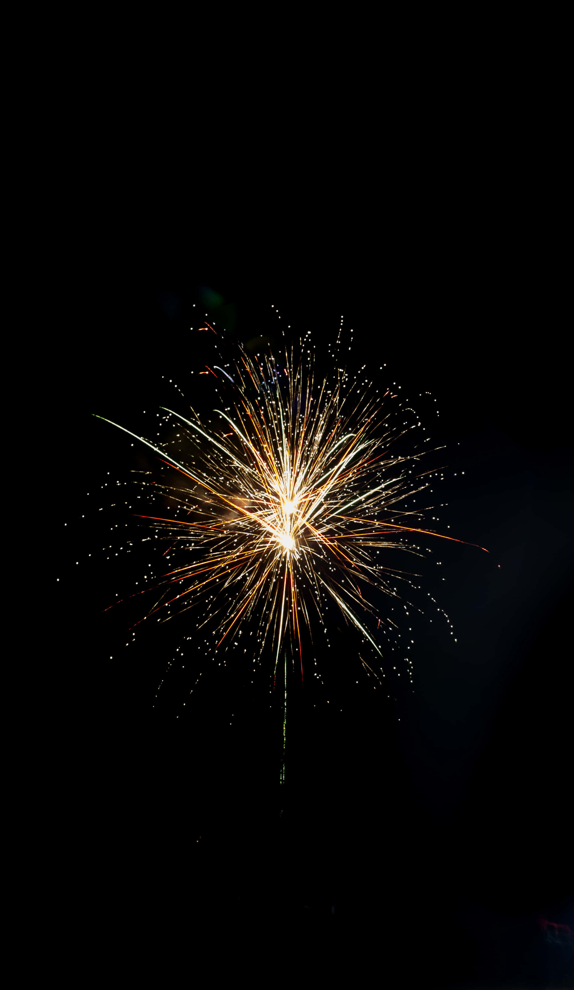 O imagine cu un foc de artificii auriu Fundal