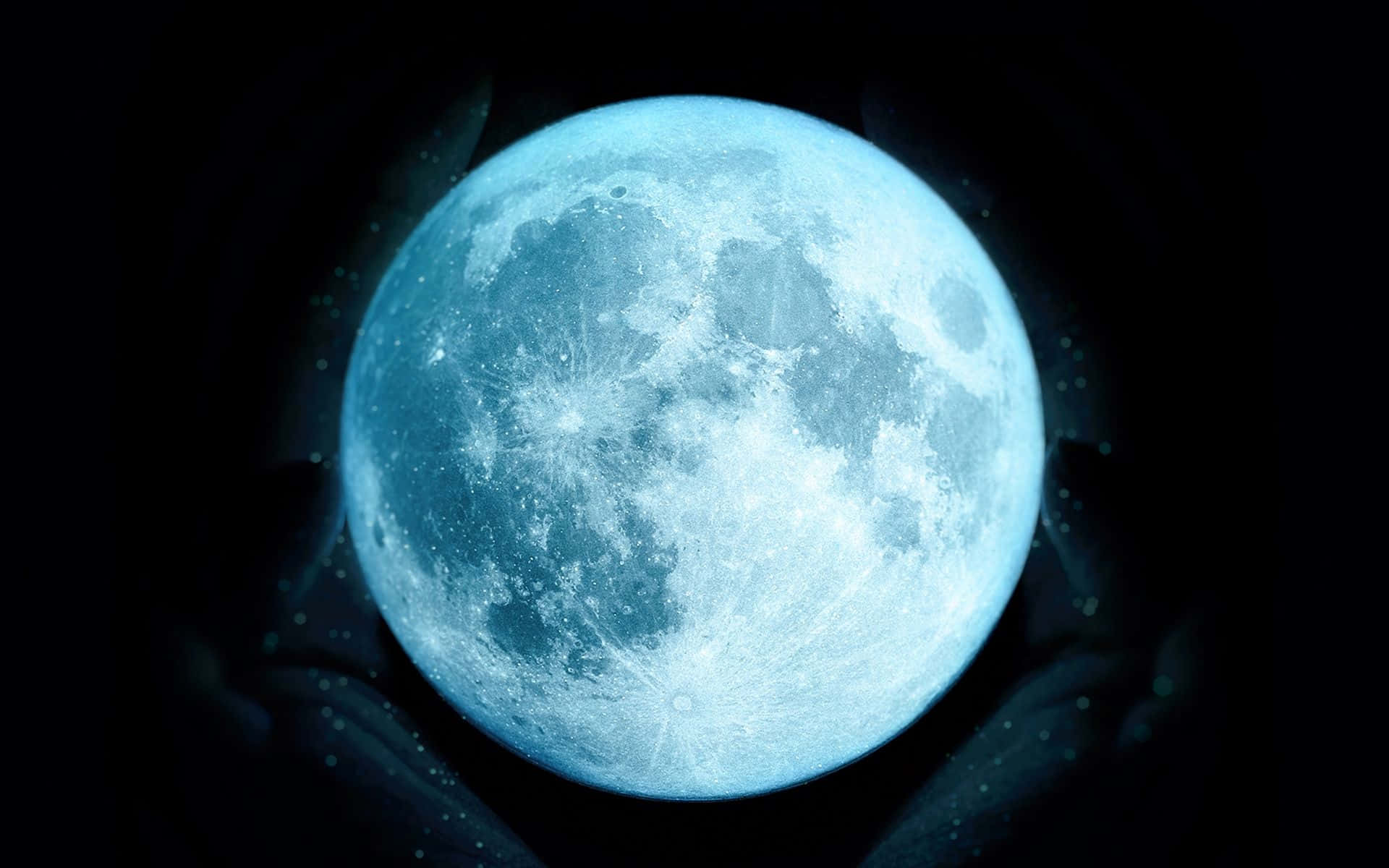 o lună albastră cu mâini în fundal