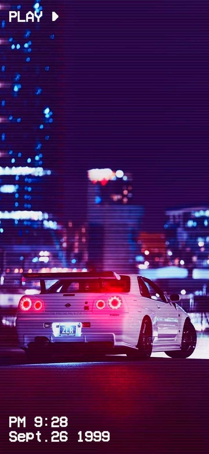 O mașină vintage pe stradă, un Nissan Skyline JDM clasic Fundal